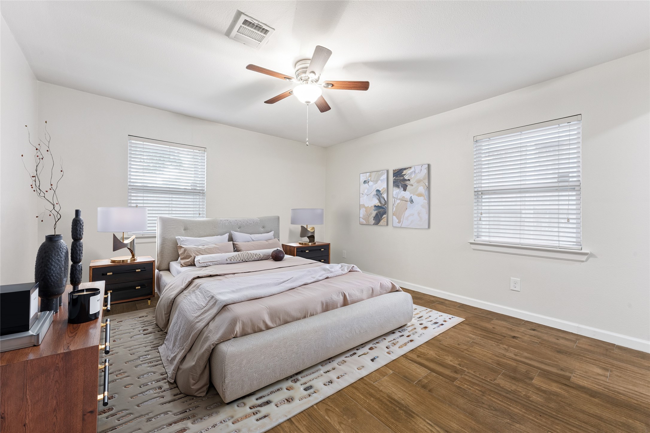 3810 Grennoch Lane Houston, TX 77025 - Photo 9 of 17 a bed room with a bed and a chandelier