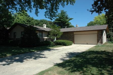 971 Ruth Drive Elgin, IL 60123 - Photo 1 of 1 a front view of a house with a yard and garage
