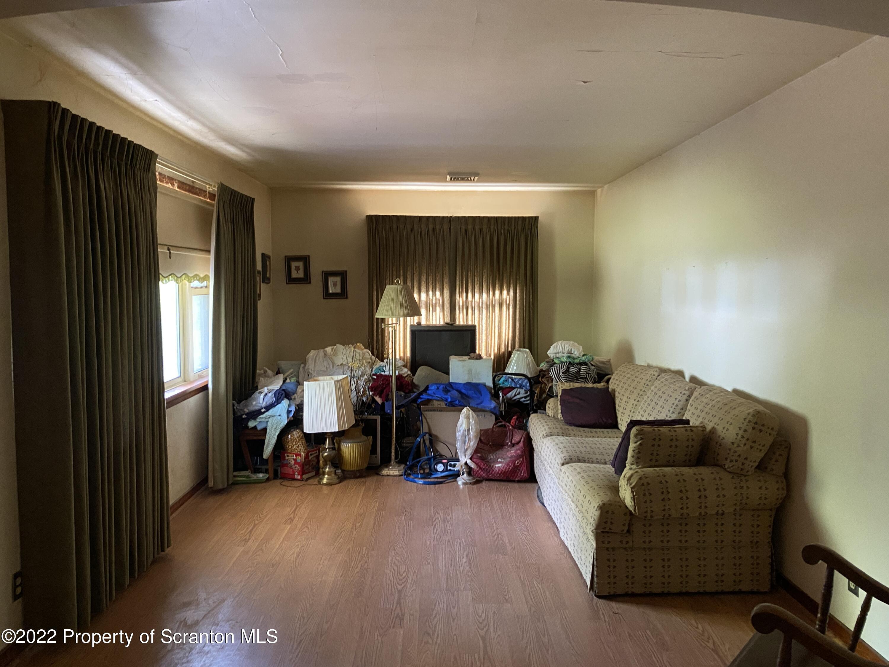 2008 South Webster Avenue Scranton, PA 18505 - Photo 6 of 37 a living room with furniture and a large window