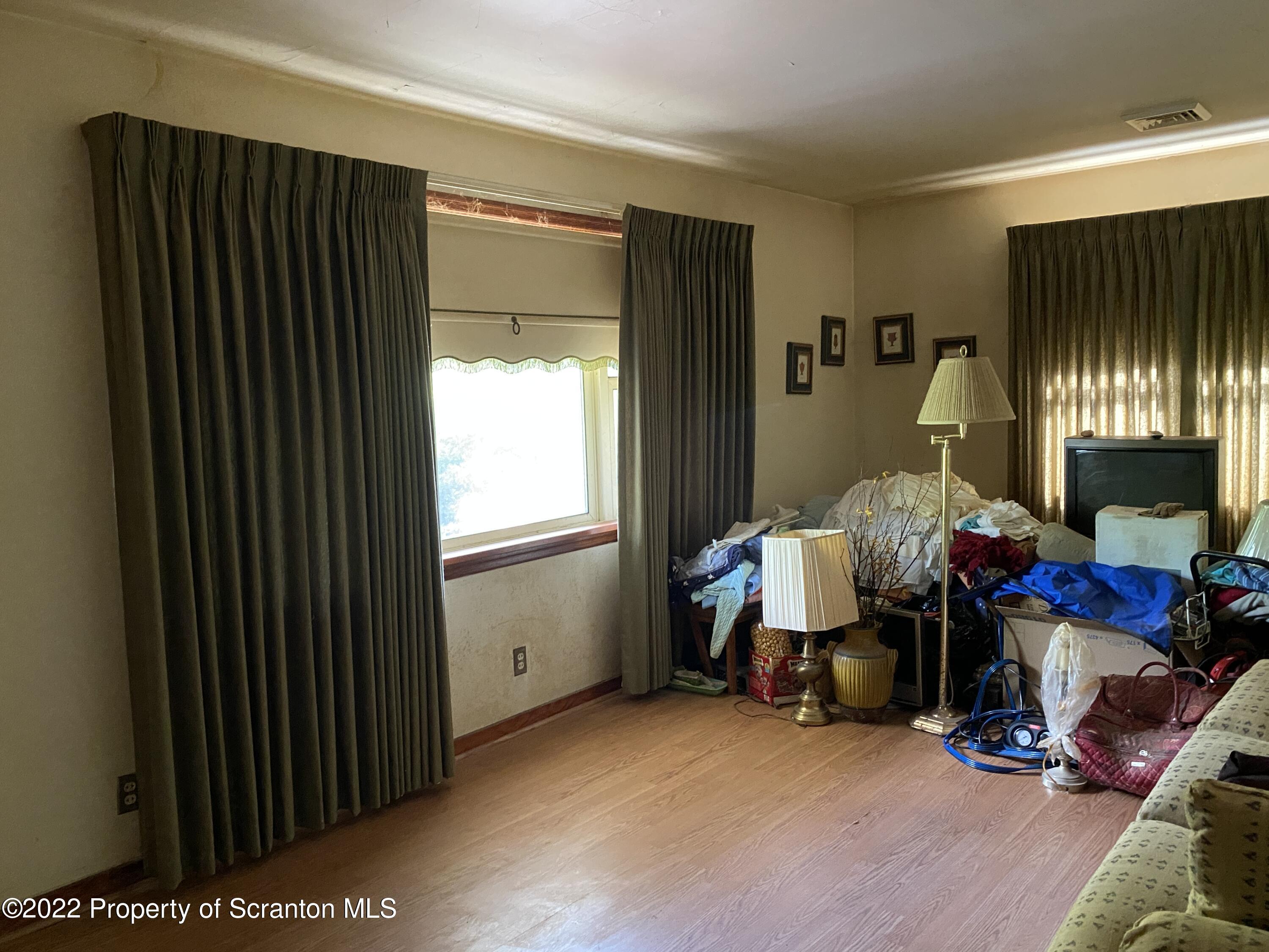 2008 South Webster Avenue Scranton, PA 18505 - Photo 7 of 37 a living room with furniture and a flat screen tv