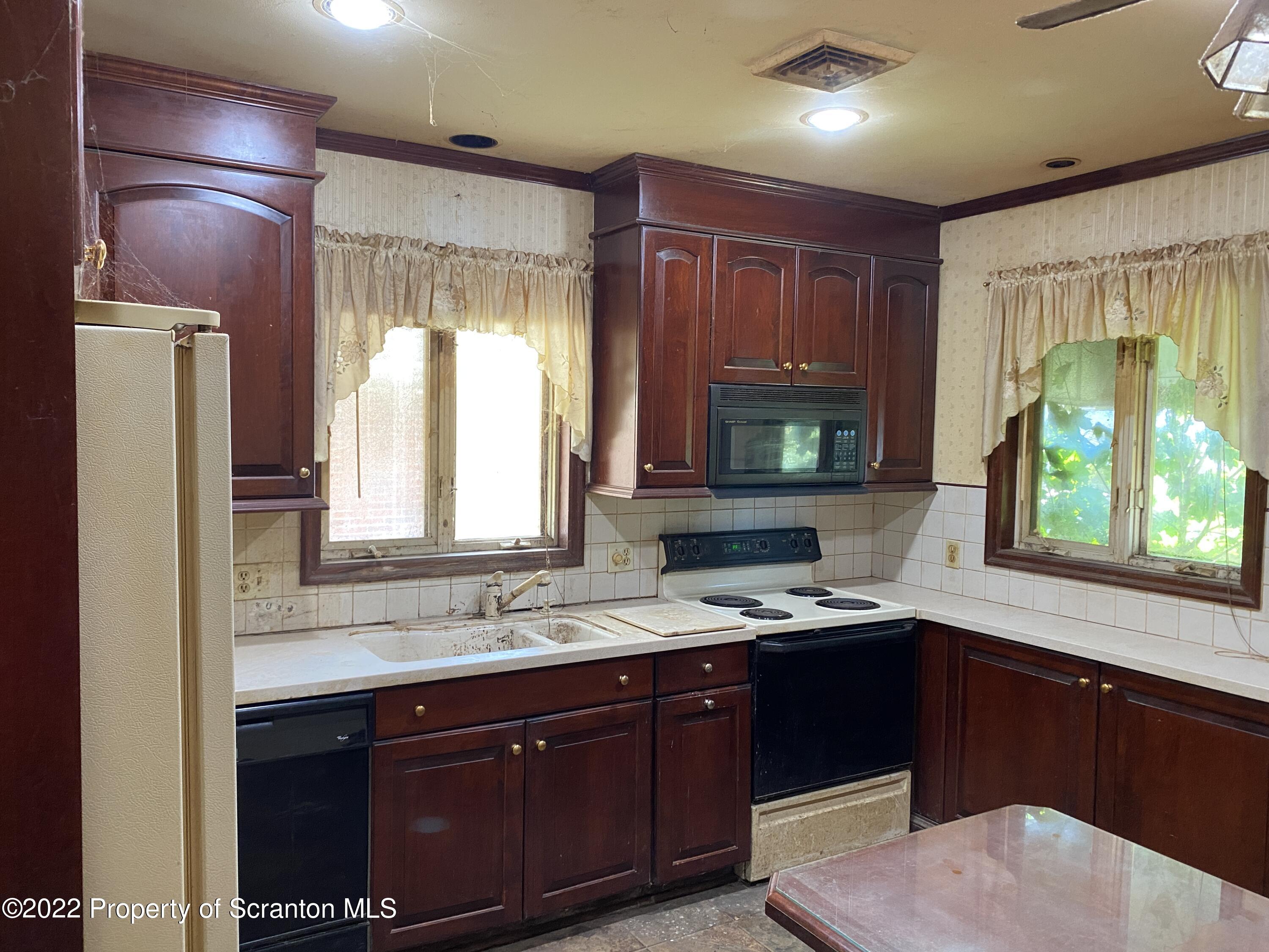 2008 South Webster Avenue Scranton, PA 18505 - Photo 9 of 37 a kitchen with a sink and a window
