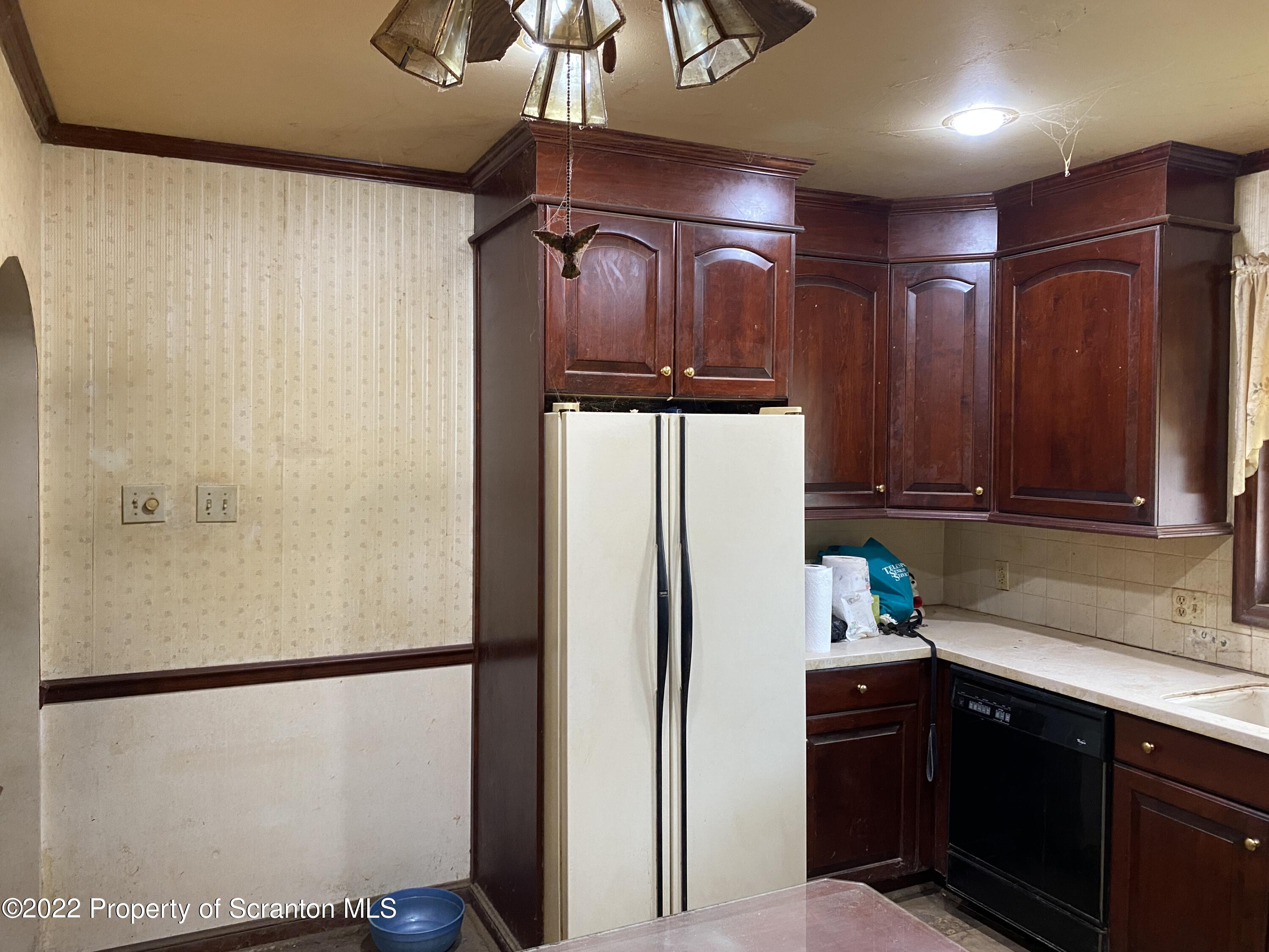 2008 South Webster Avenue Scranton, PA 18505 - Photo 10 of 37 a kitchen with stainless steel appliances granite countertop a refrigerator and a sink
