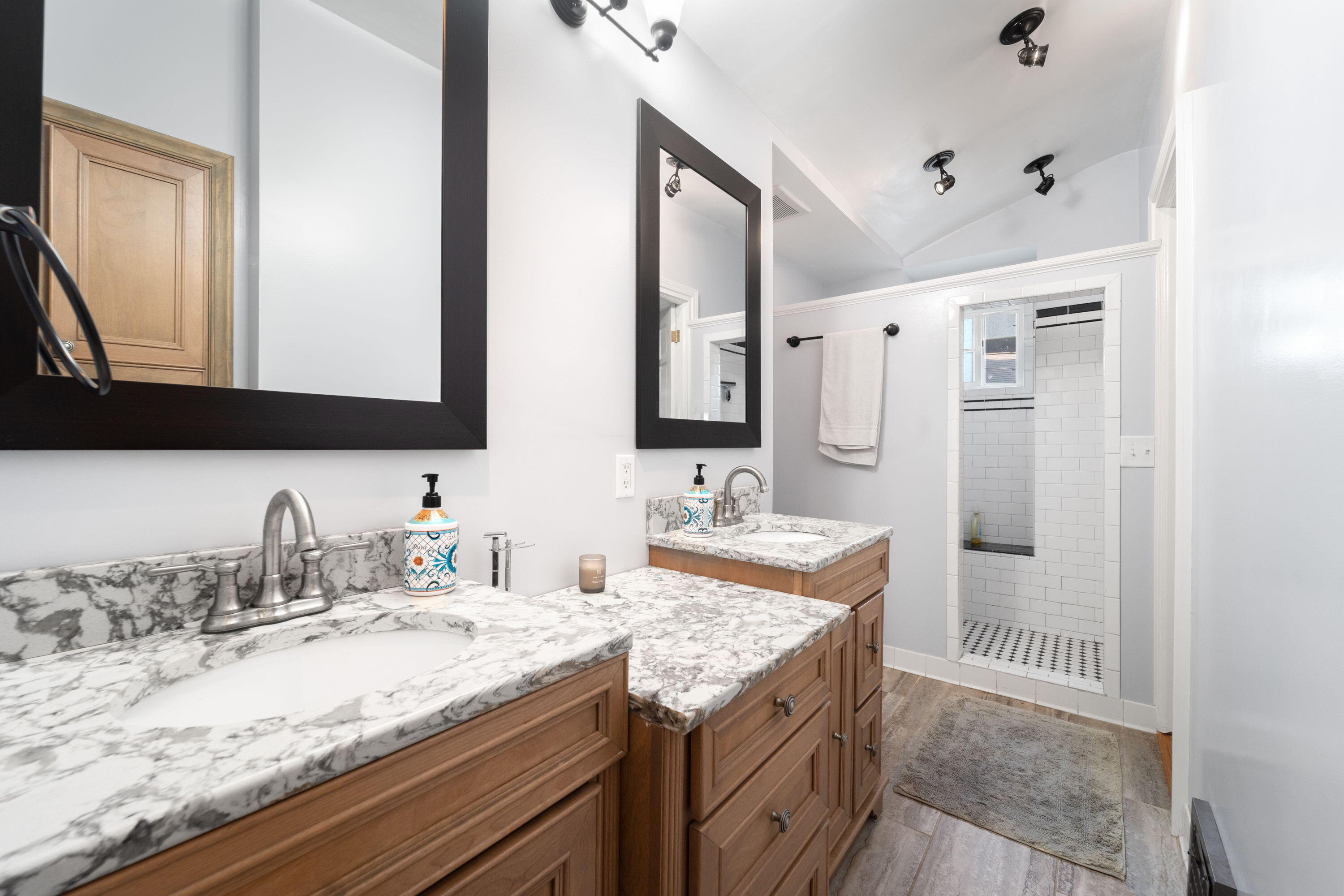 1213 College Avenue Racine, WI 53403 - Photo 13 of 31 Beautifully updated main bathroom with a large walk-in closet showcasing modern finishes paired with timeless style.