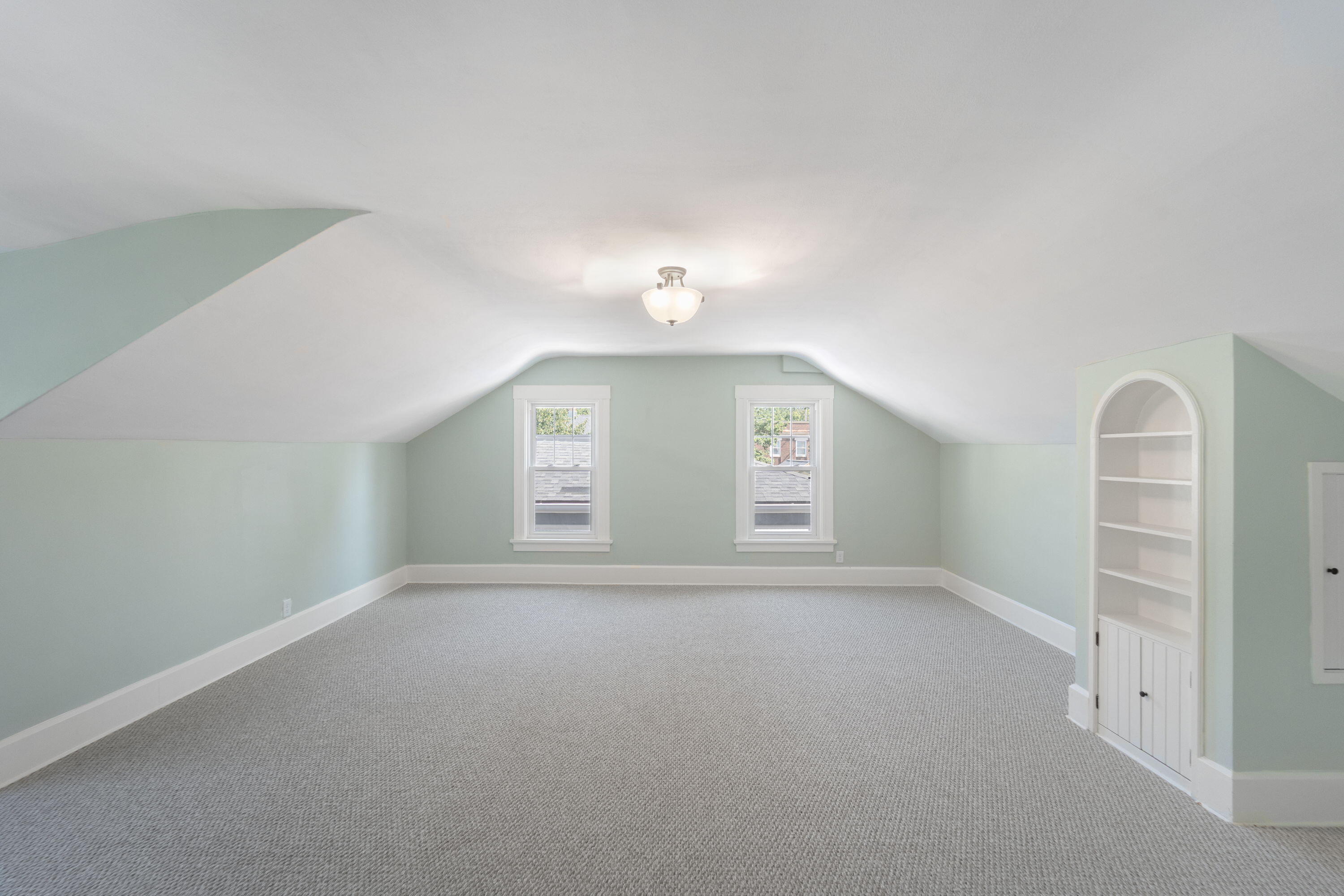 1213 College Avenue Racine, WI 53403 - Photo 19 of 31 Expansive upstairs master suite—your own luxurious retreat or the ultimate kids’ bedroom and playroom combo, offering endless versatility and space to live, play, and relax in style.