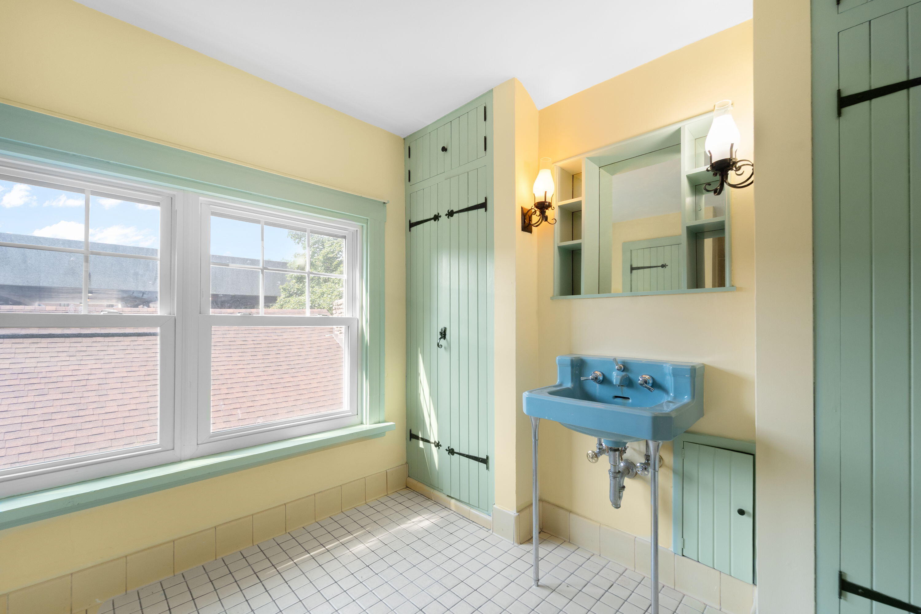 1213 College Avenue Racine, WI 53403 - Photo 22 of 31 Charming original full bathroom in the upper suite, rich with character and timeless appeal—ready to be enjoyed as-is or elevated with your personal touch.