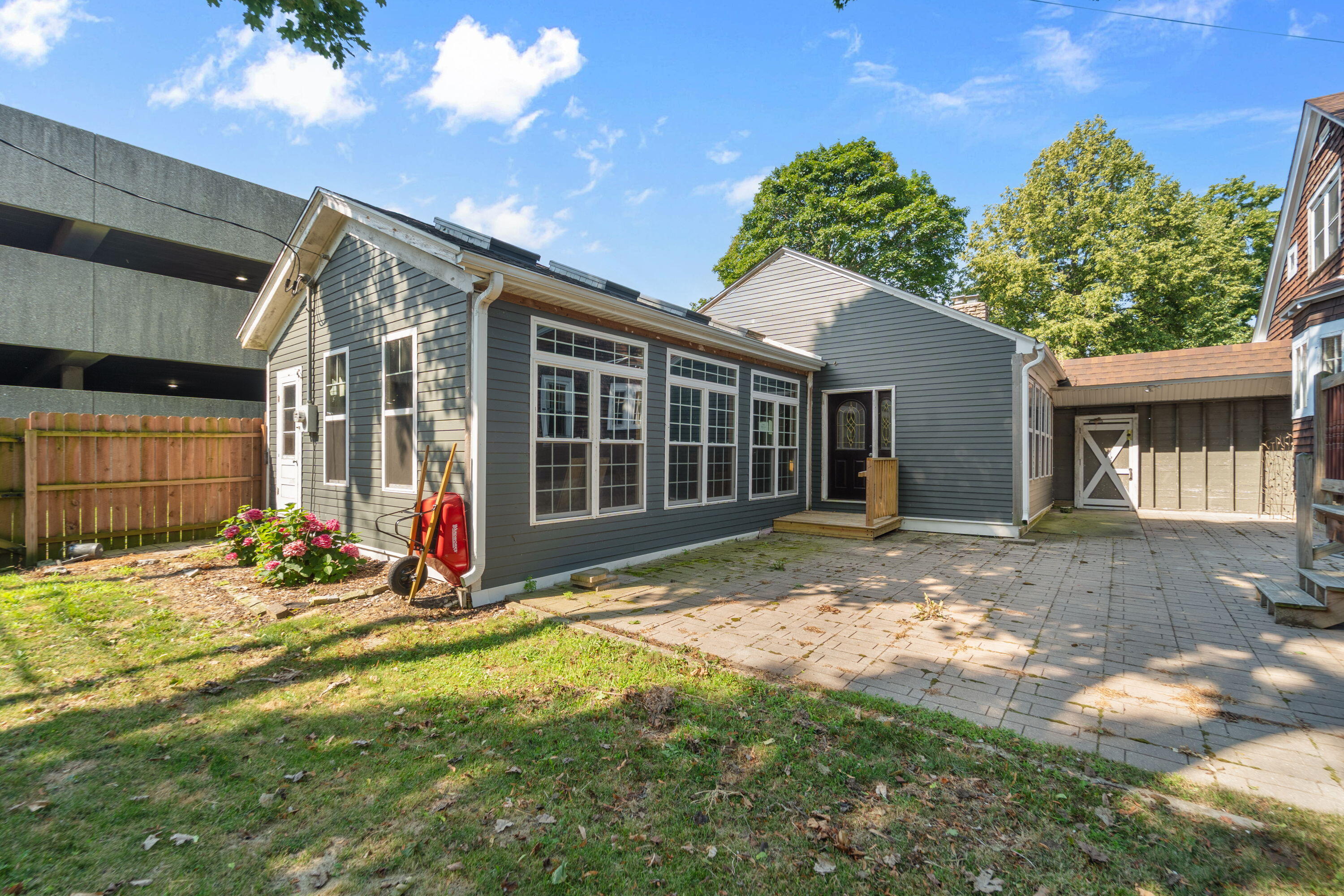 1213 College Avenue Racine, WI 53403 - Photo 29 of 31 The brick courtyard offers a private outdoor retreat, perfect for relaxing or entertaining
