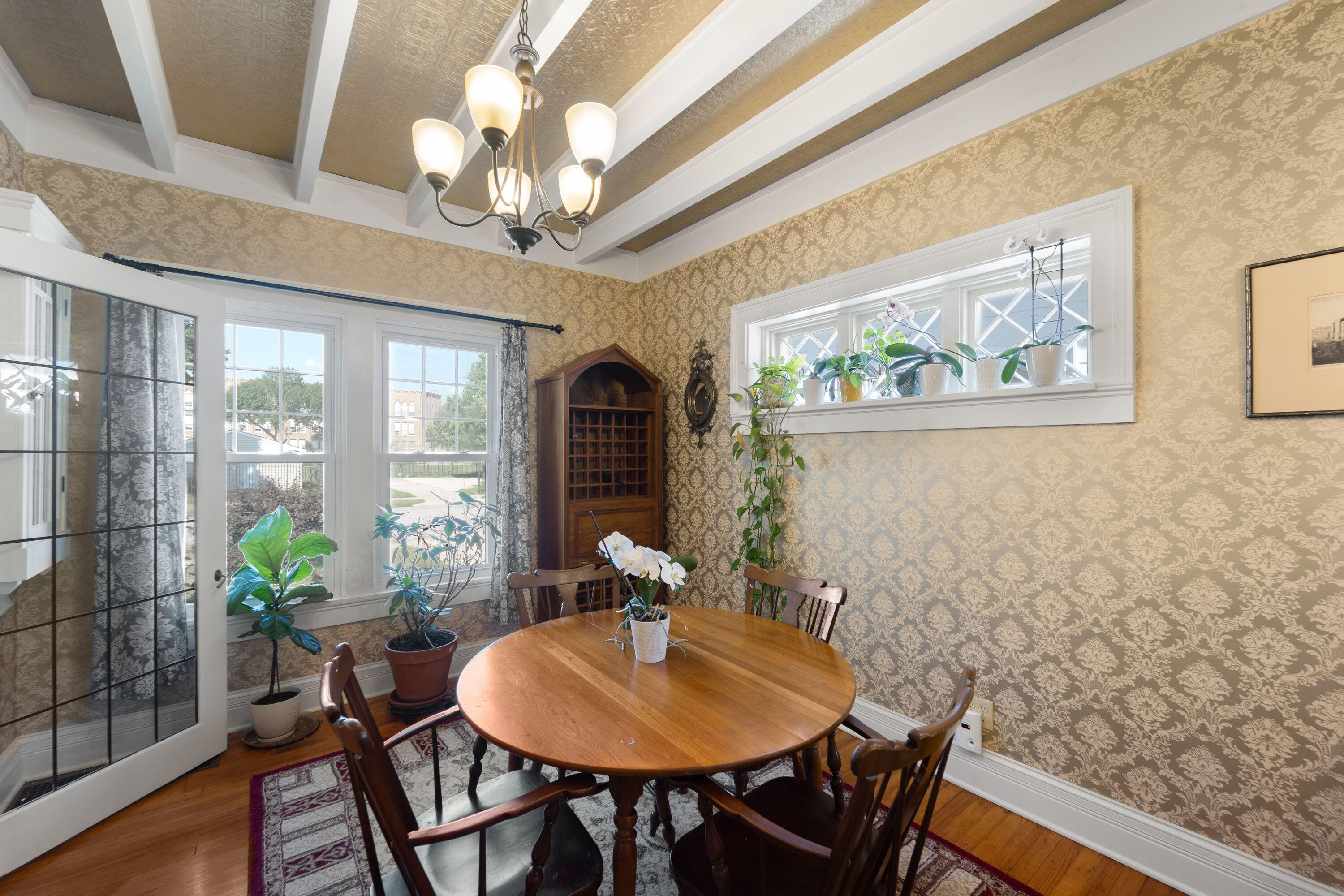 1213 College Avenue Racine, WI 53403 - Photo 7 of 31 Charming French doors and unique window panes add character while gracefully separating the living and dining spaces