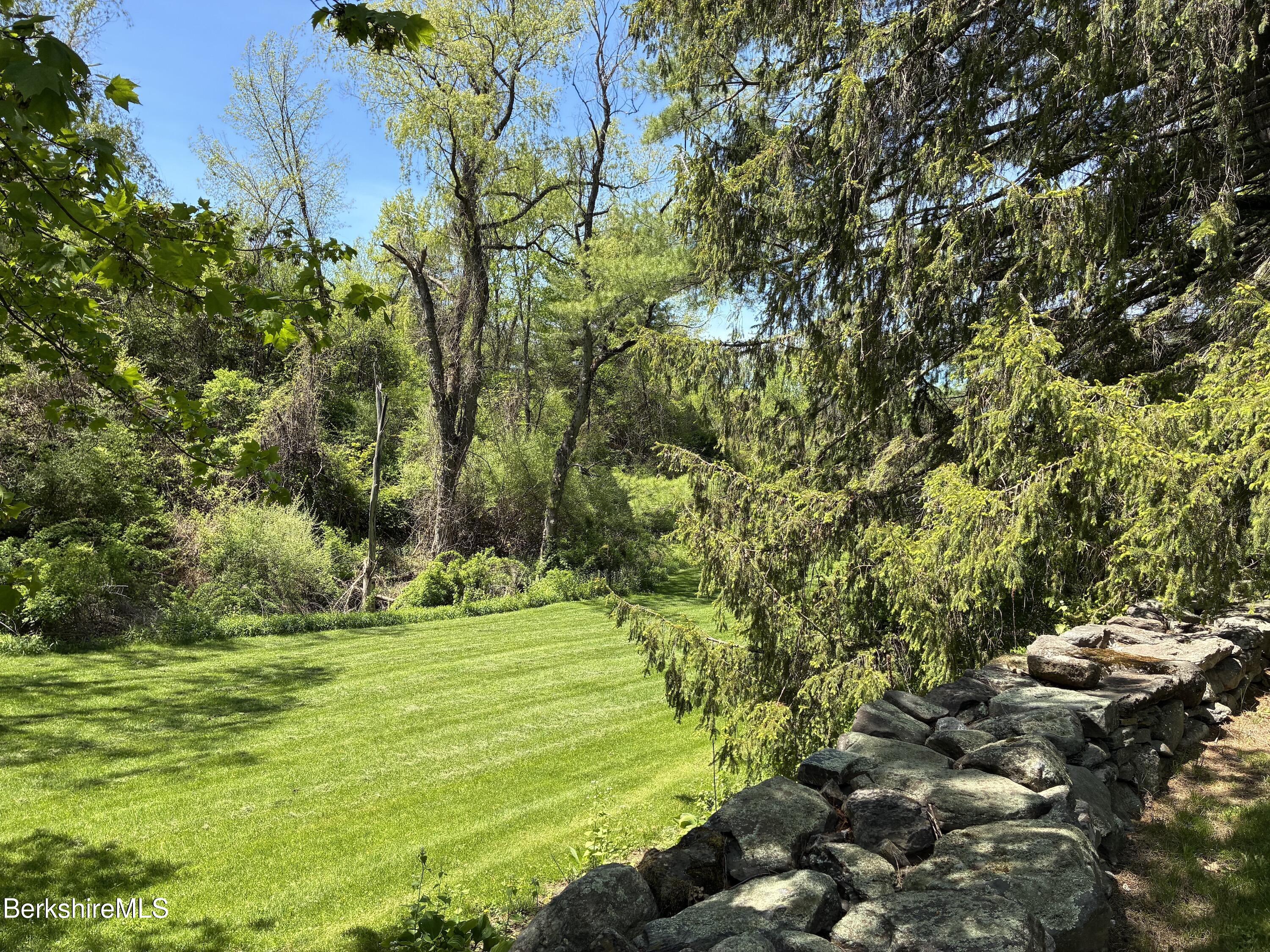 137 E Road Alford, MA 01266 - Photo 31 of 32 a view of a golf course with a trees