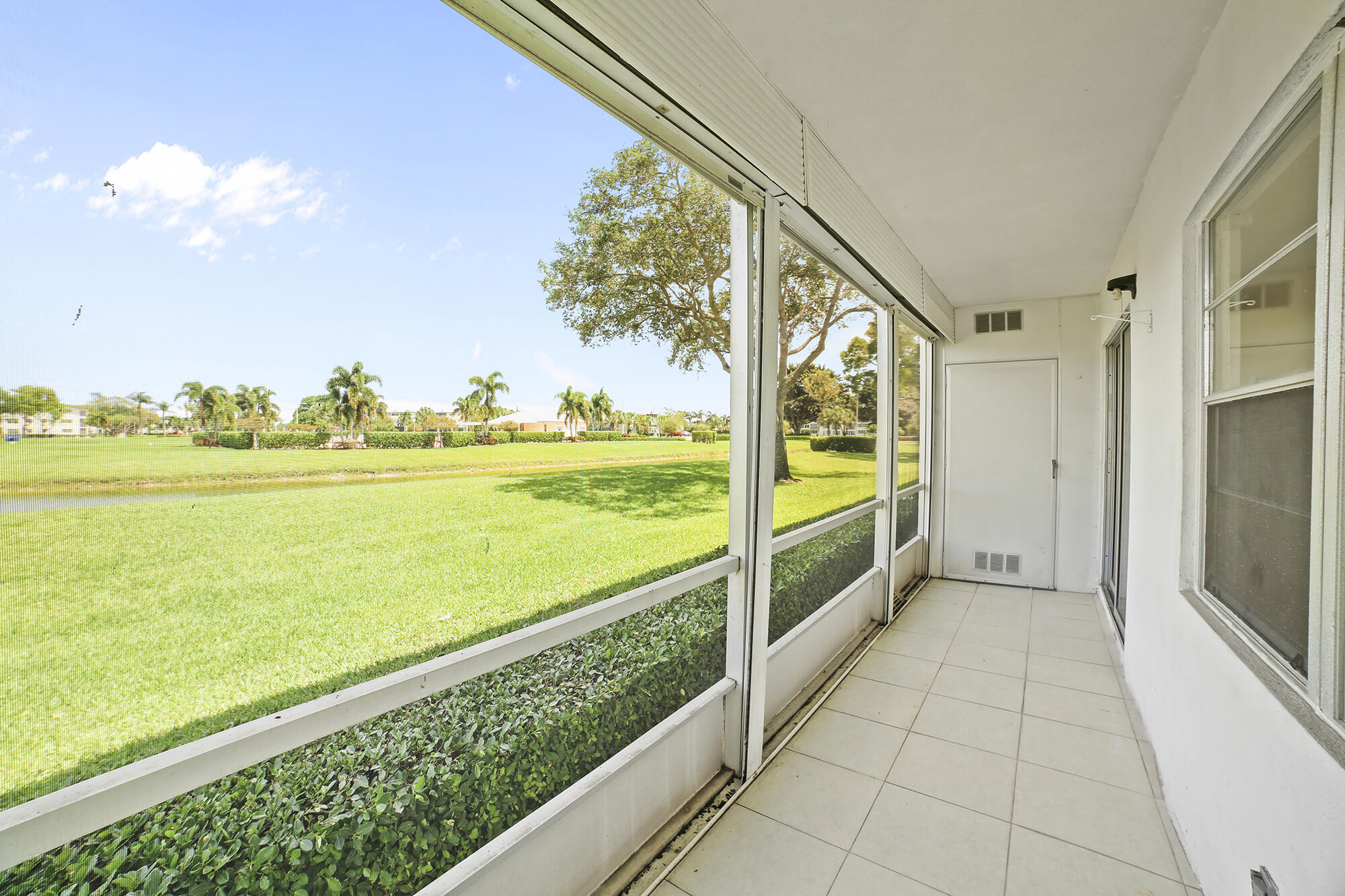 182 Preston F, Unit 182 Boca Raton, FL 33434 - Photo 14 of 17 a view of an ocean and an entryway