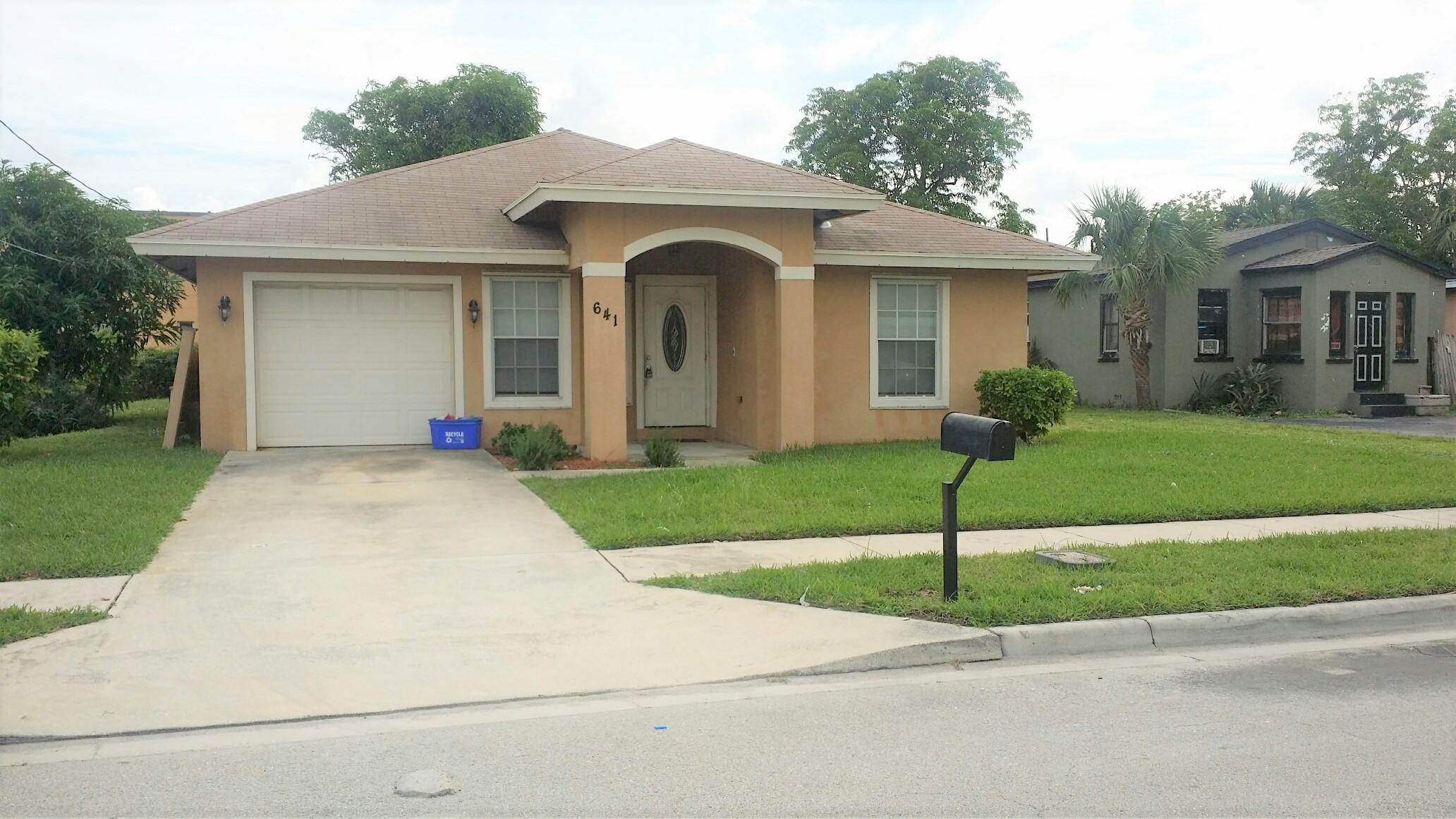 641 West 10th Street Riviera Beach, FL 33404 - Photo 1 of 24 Guerdy1