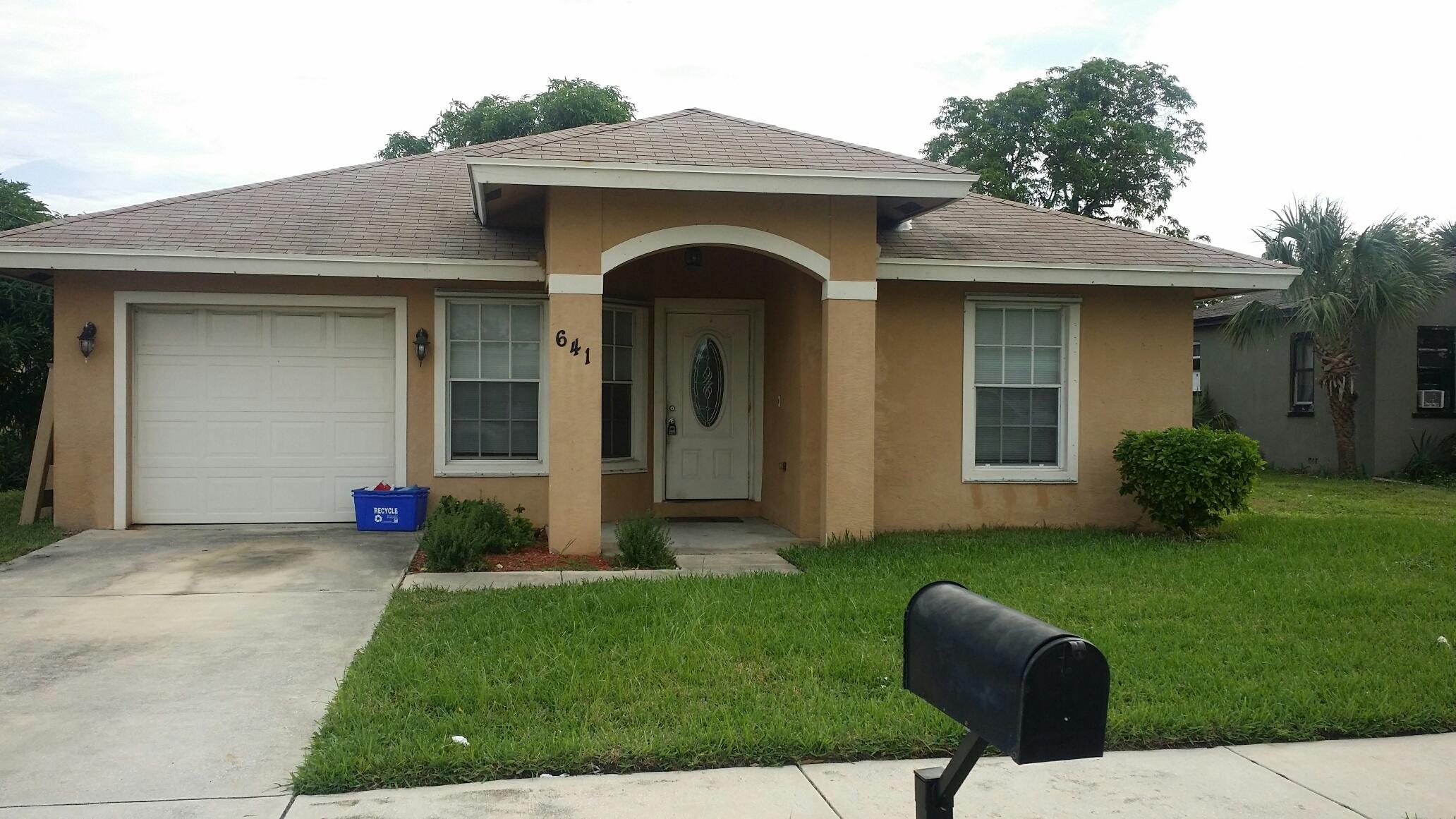 641 West 10th Street Riviera Beach, FL 33404 - Photo 2 of 24 FRONT