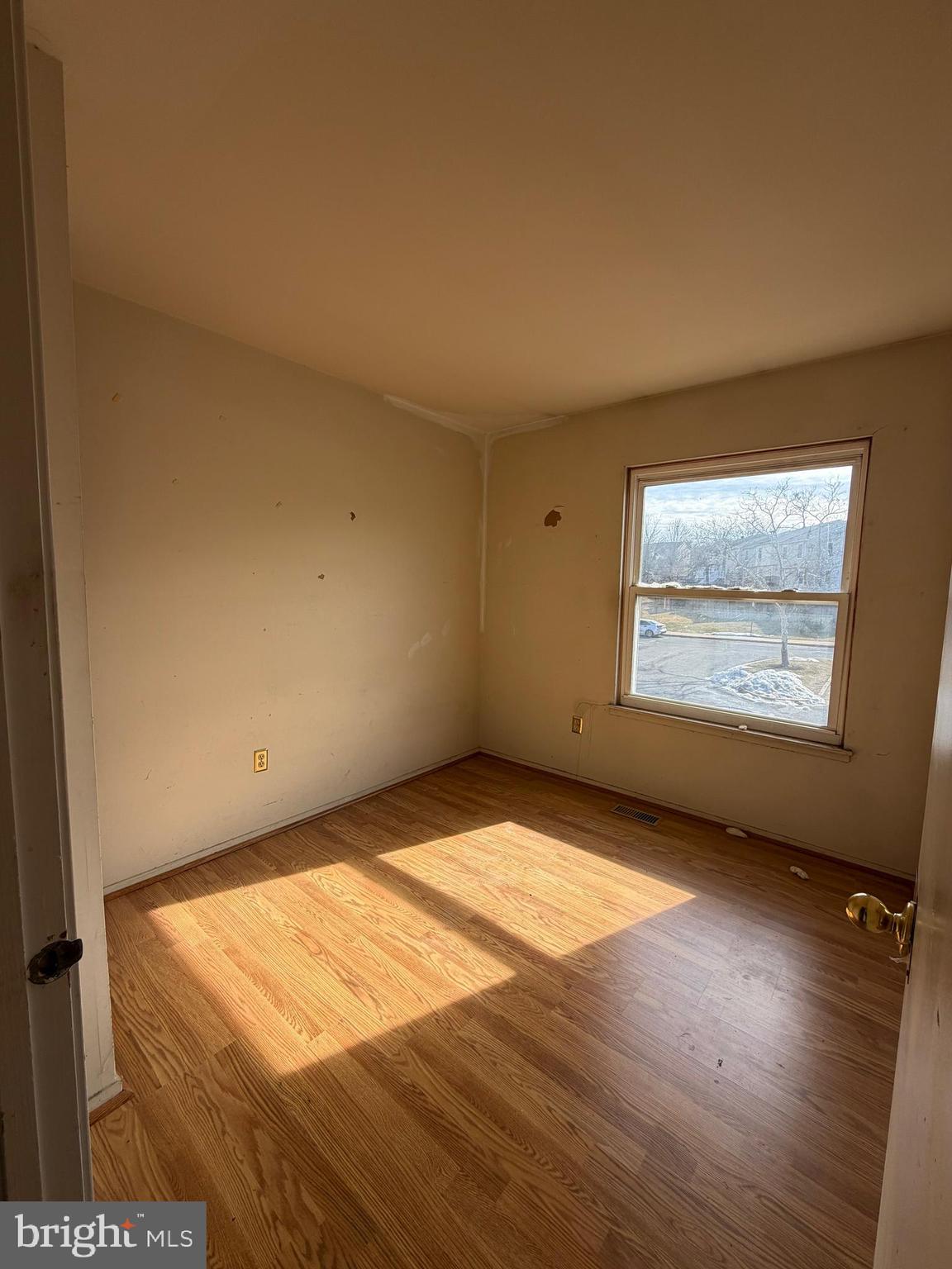 56 Apple Way Frederick, MD 21703 - Photo 11 of 14 a view of an empty room and window