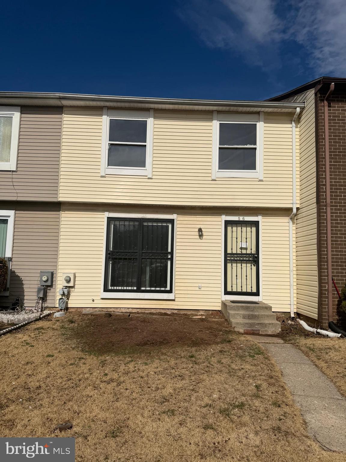 56 Apple Way Frederick, MD 21703 - Photo 2 of 14 a front view of a house with a yard