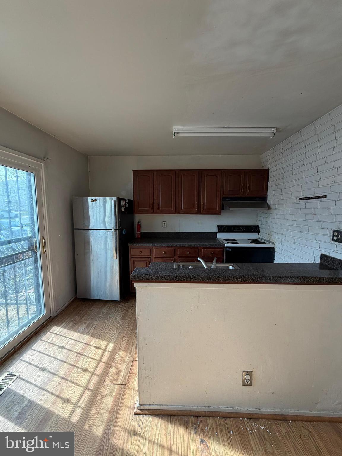 56 Apple Way Frederick, MD 21703 - Photo 5 of 14 a view of kitchen with stainless steel appliances granite countertop a refrigerator and a stove top oven