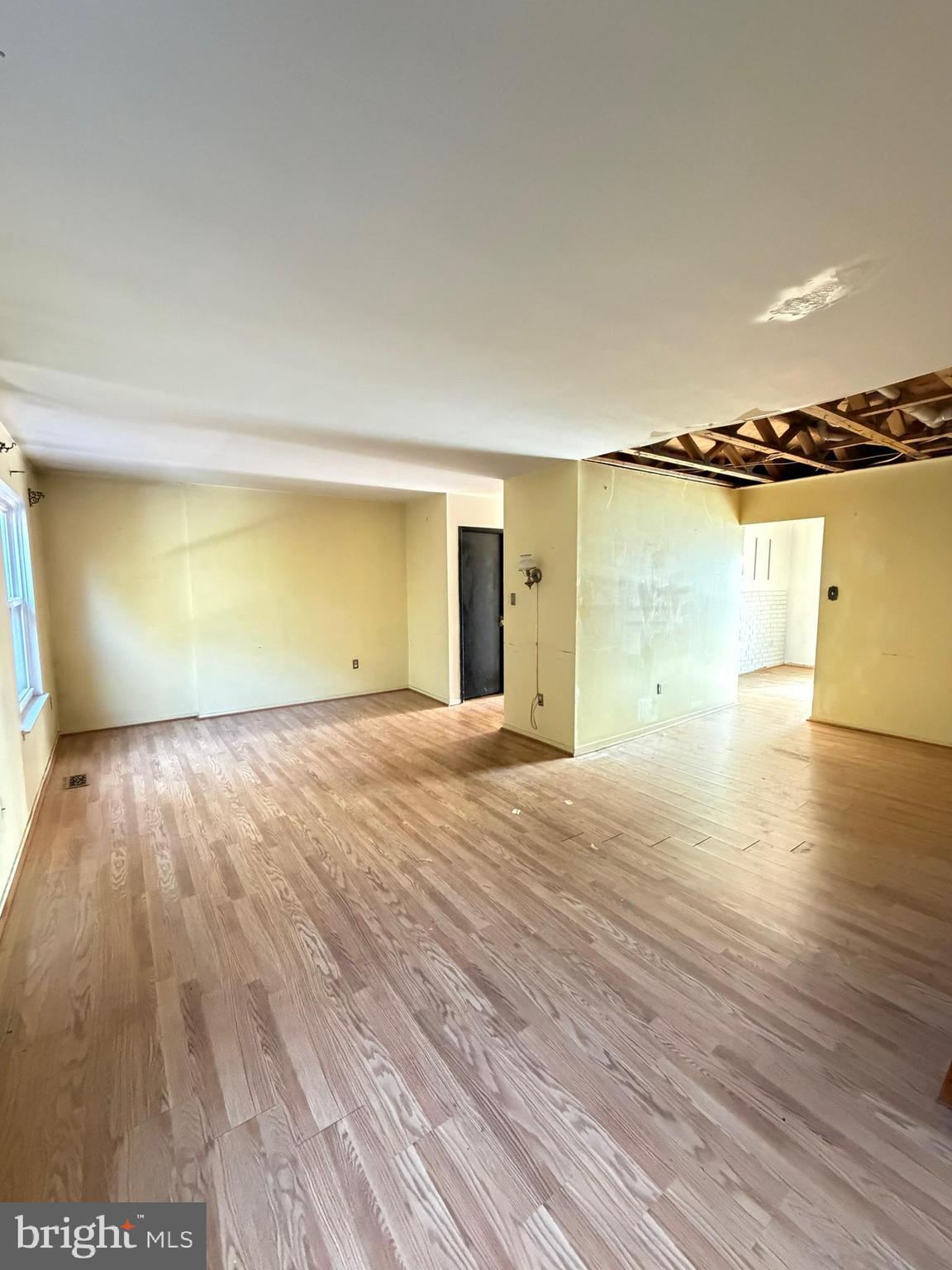 56 Apple Way Frederick, MD 21703 - Photo 7 of 14 a view of a room with wooden floor and a ocean view