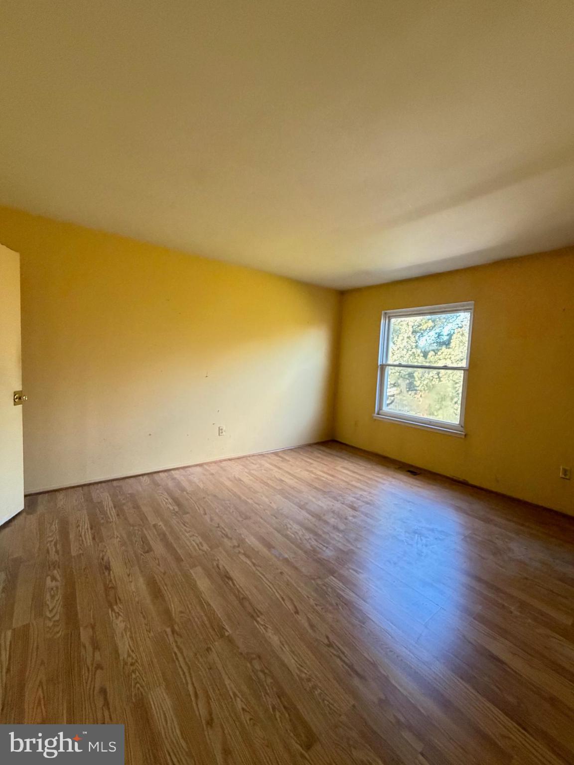 56 Apple Way Frederick, MD 21703 - Photo 9 of 14 a view of an empty room with a window