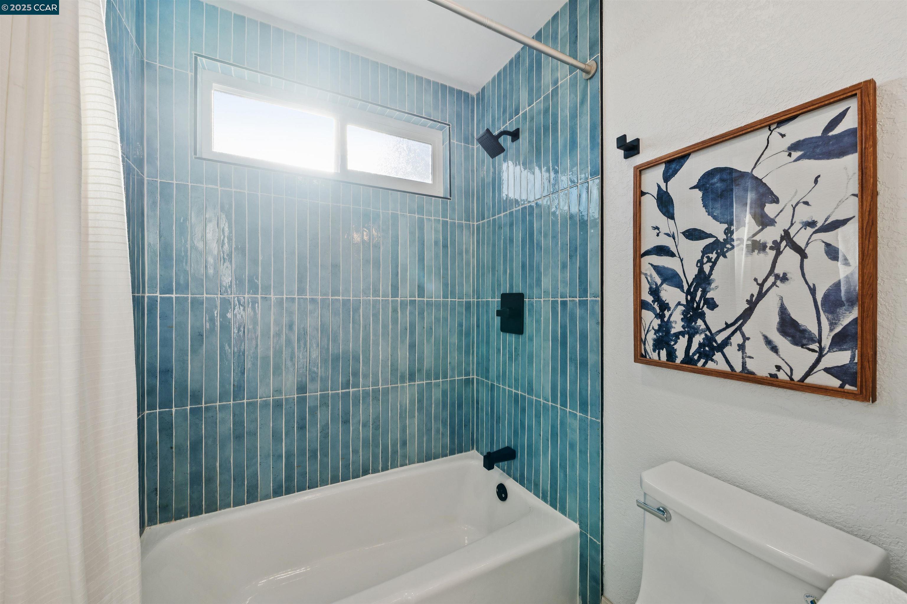 6 San Pedro Place San Ramon, CA 94583 - Photo 31 of 57 a bathroom with a bathtub and shower