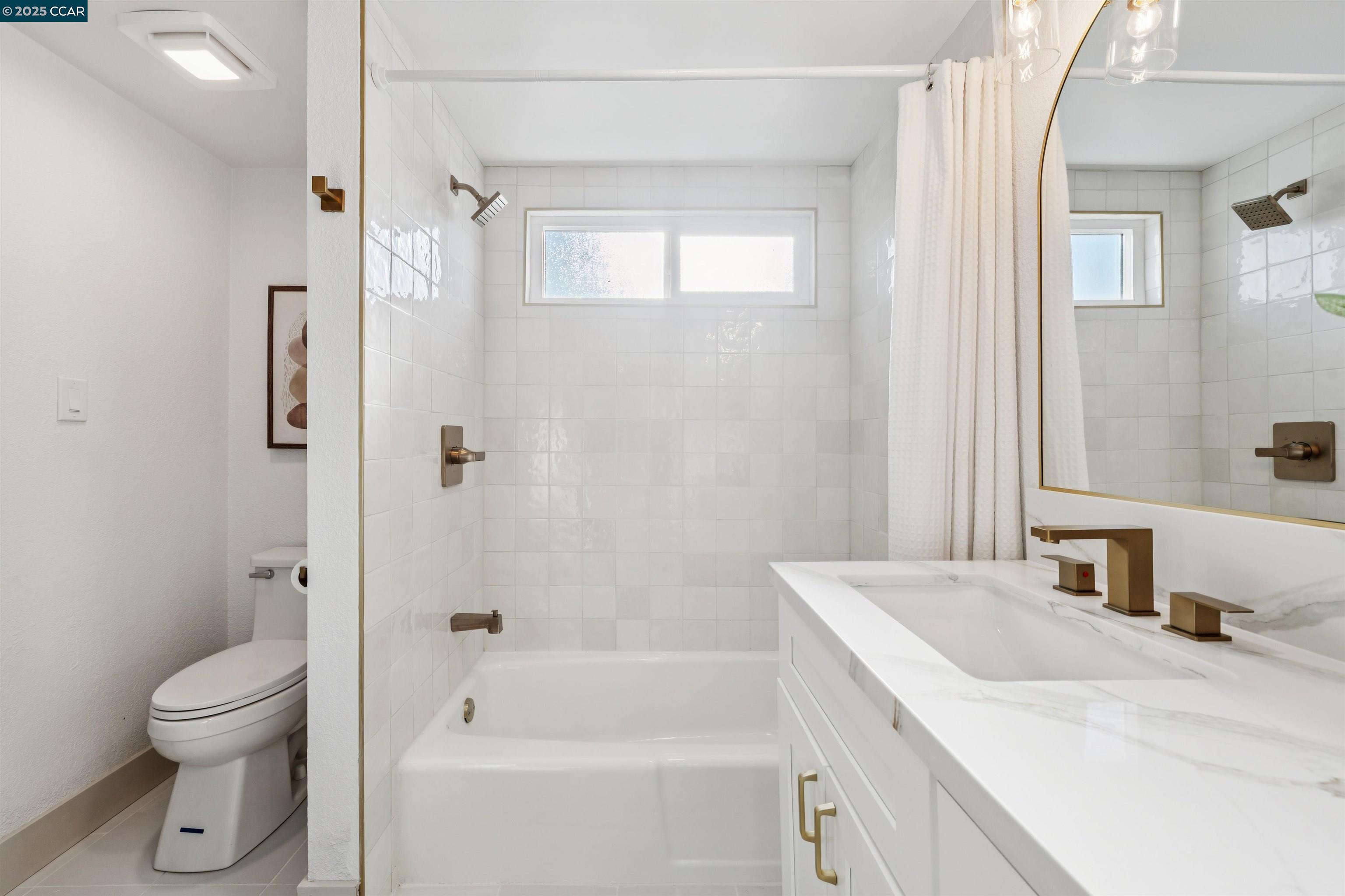 6 San Pedro Place San Ramon, CA 94583 - Photo 41 of 57 a bathroom with a sink toilet vanity and shower