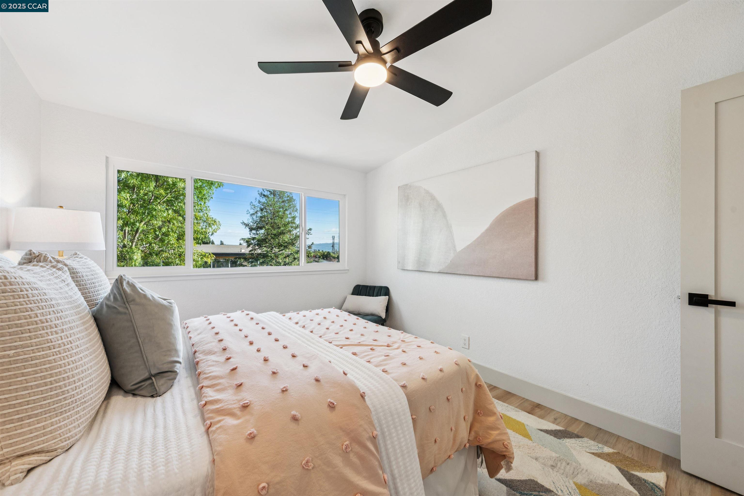 6 San Pedro Place San Ramon, CA 94583 - Photo 44 of 57 a bedroom with a large bed and a window