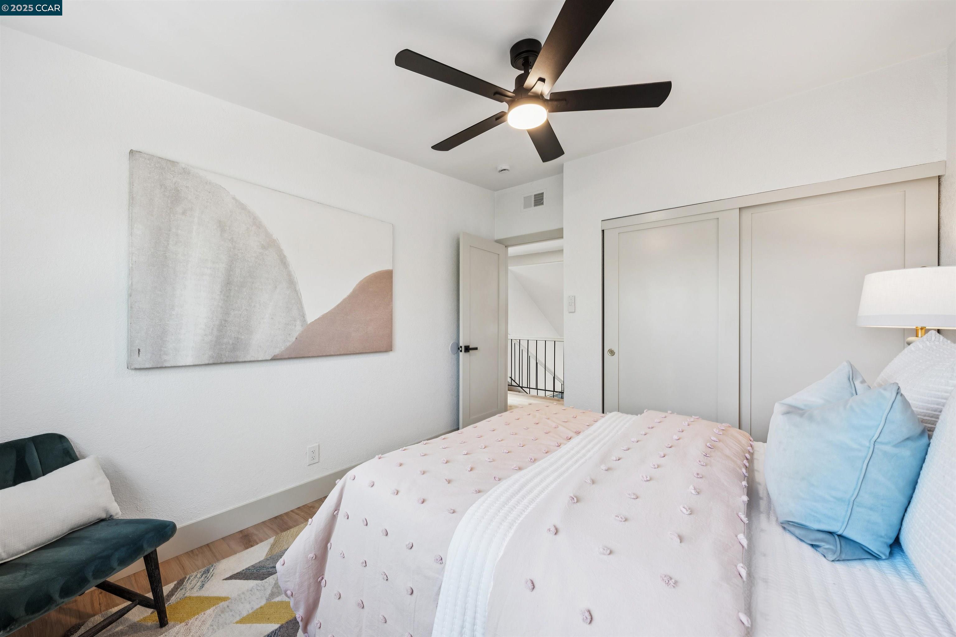 6 San Pedro Place San Ramon, CA 94583 - Photo 46 of 57 a bedroom with a bed and a chandelier