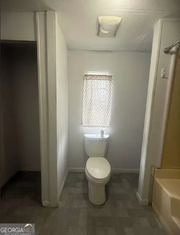 a bathroom with a sink and a toilet