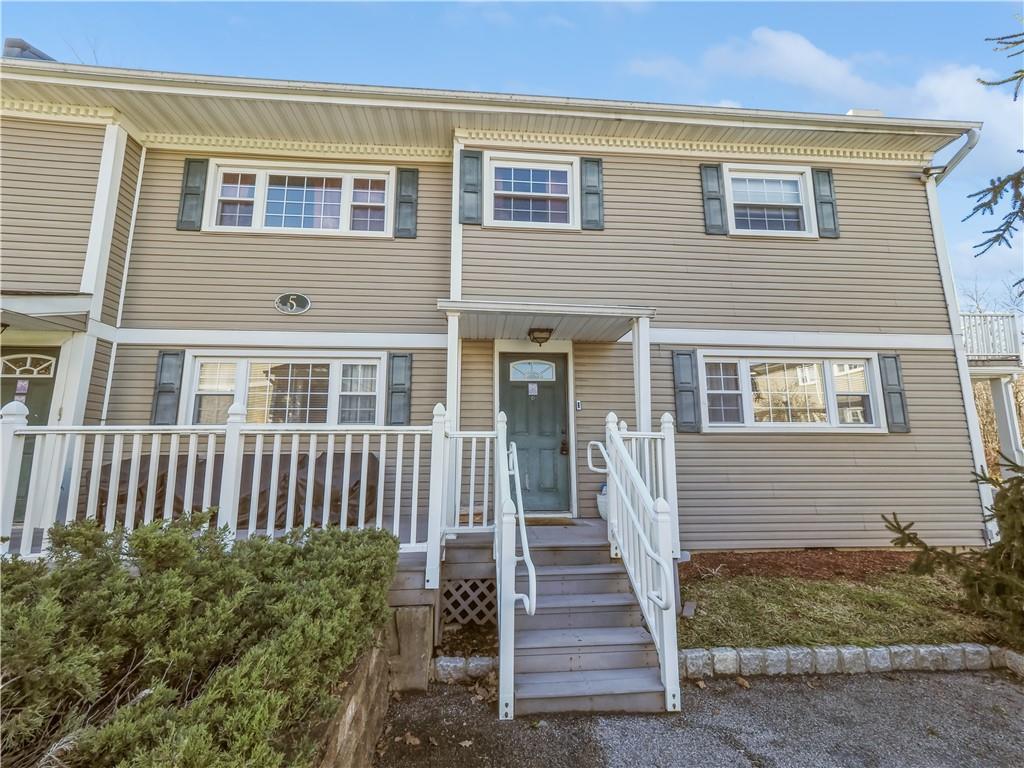 375 Salt Point Turnpike, Unit 5B Poughkeepsie, NY 12603 - Photo 1 of 1 a front view of a house with a yard
