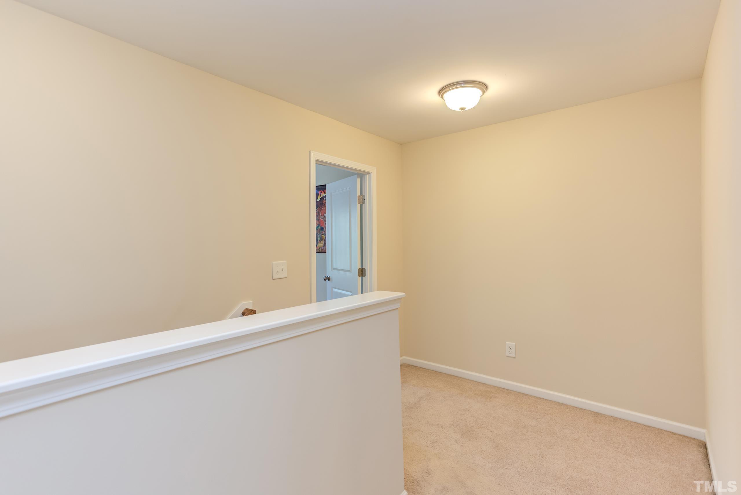 1313 Still Monument Way Raleigh, NC 27603 - Photo 26 of 35 a view of an empty room