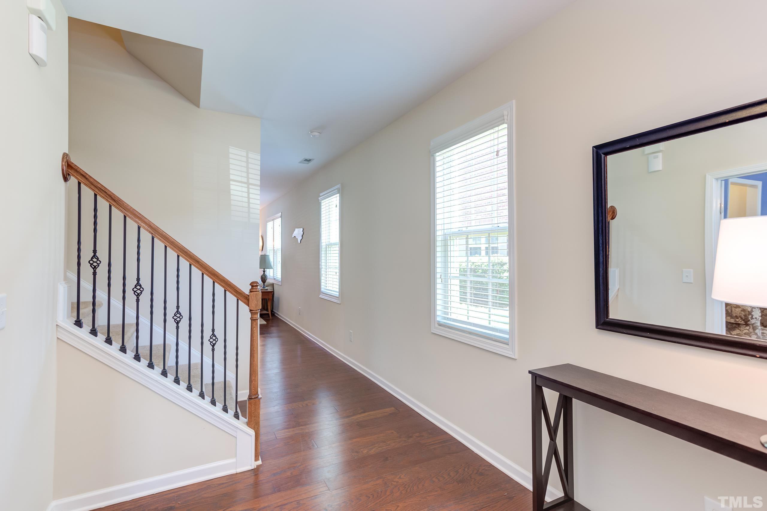 1313 Still Monument Way Raleigh, NC 27603 - Photo 4 of 35 a view of an entryway with wooden floor