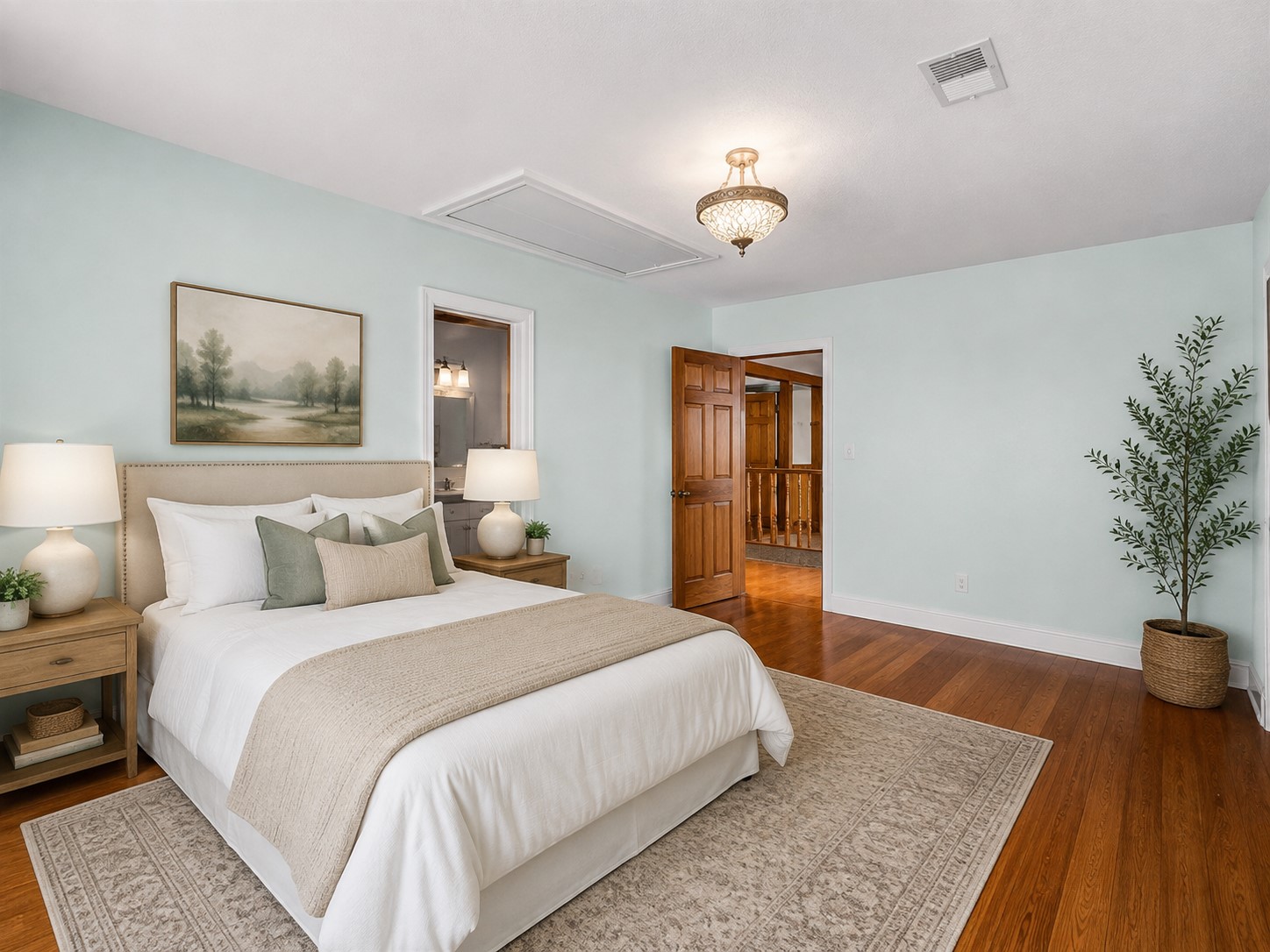 8412 Hidden Trail Lane Spring, TX 77379 - Photo 24 of 36 **Virtually Staged** to showcase this spacious secondary bedroom with beautiful hardwood flooring and plenty of room for comfortable furnishings.