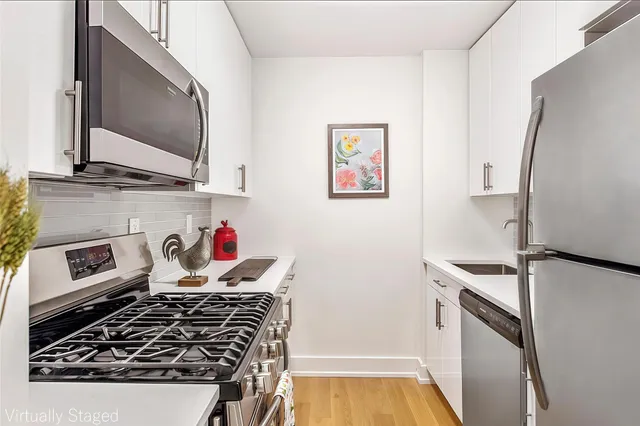 a kitchen with a stove and a microwave
