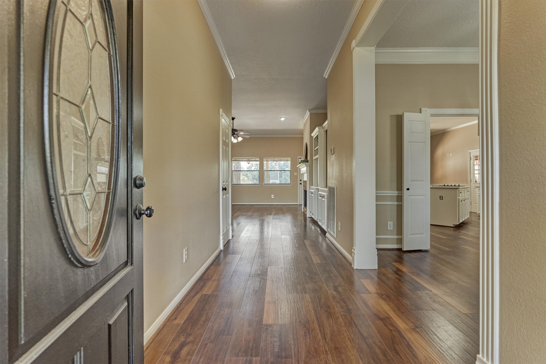16024 Rabon Chapel Road Montgomery, TX 77316 - Photo 11 of 43 The front door opens into an entry foyer with a formal dining room on the right and living room beyond. Interior and exterior have just been freshly painted.