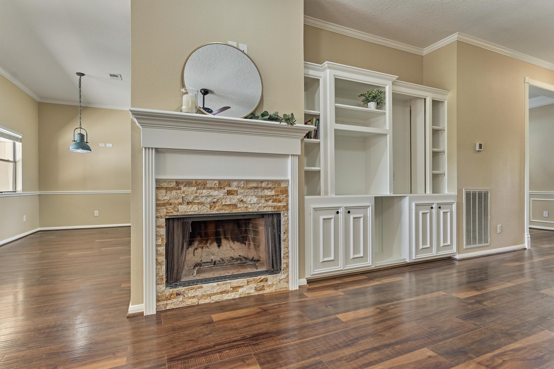 16024 Rabon Chapel Road Montgomery, TX 77316 - Photo 17 of 43 The gas fireplace has a stone surround and freshly painted mantle.