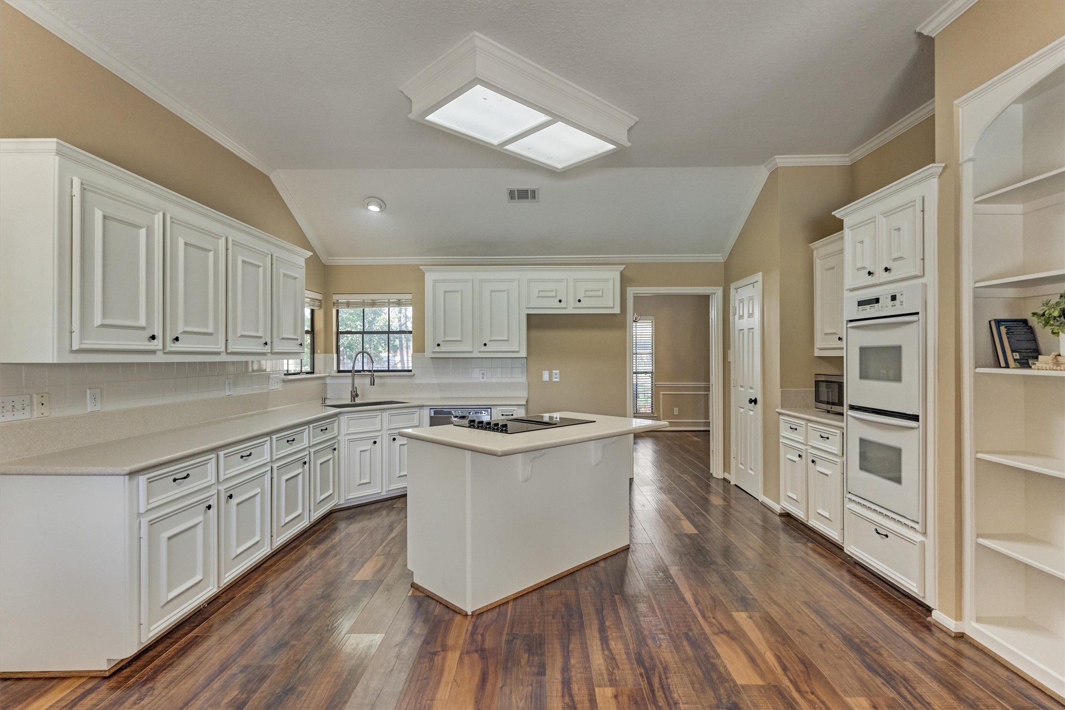 16024 Rabon Chapel Road Montgomery, TX 77316 - Photo 18 of 43 The kitchen features an abundance of counter and cabinet space. NEW double ovens add to the convenience when cooking for a large crowd.