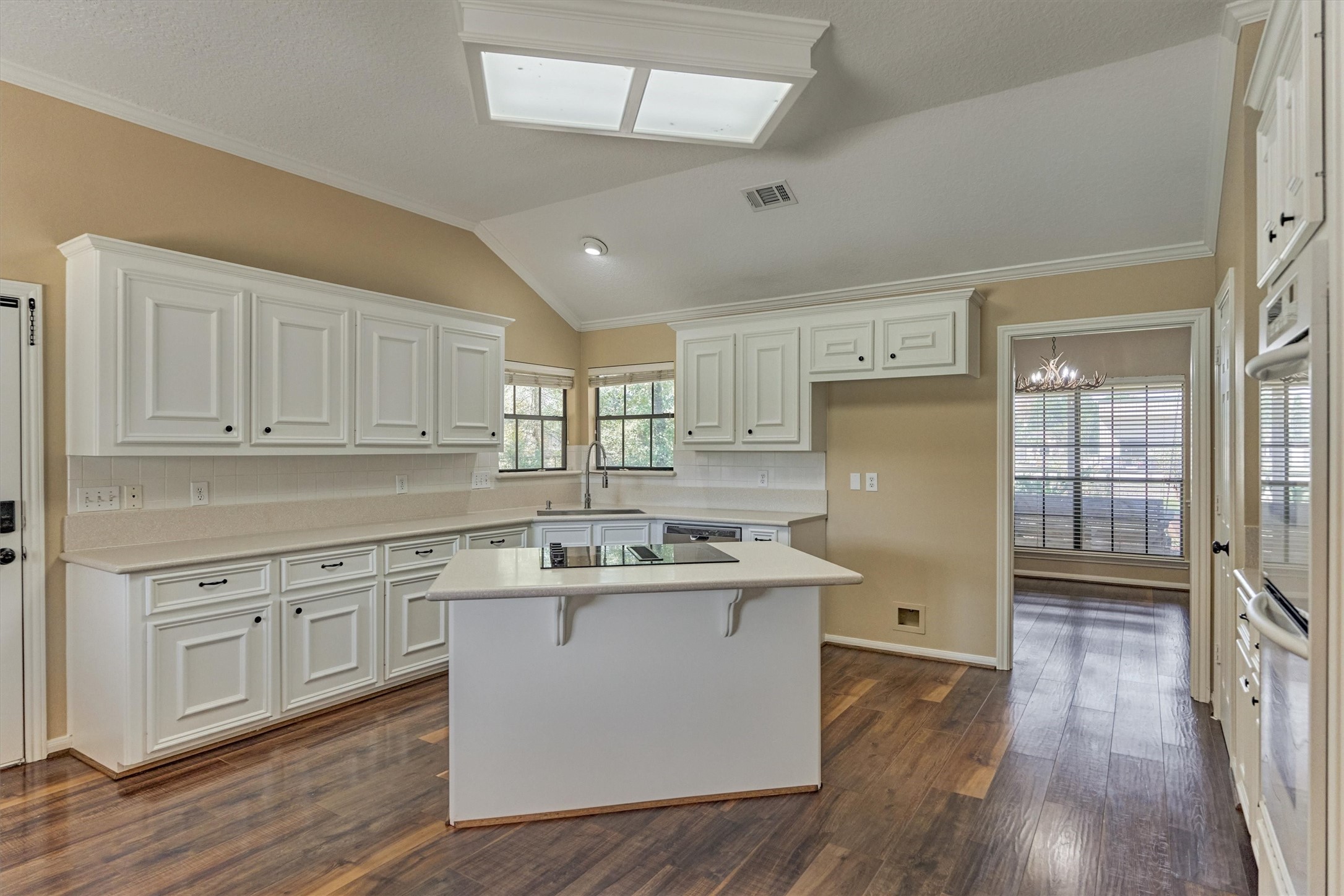 16024 Rabon Chapel Road Montgomery, TX 77316 - Photo 19 of 43 The center island has a new cooktop and provides additional seating.