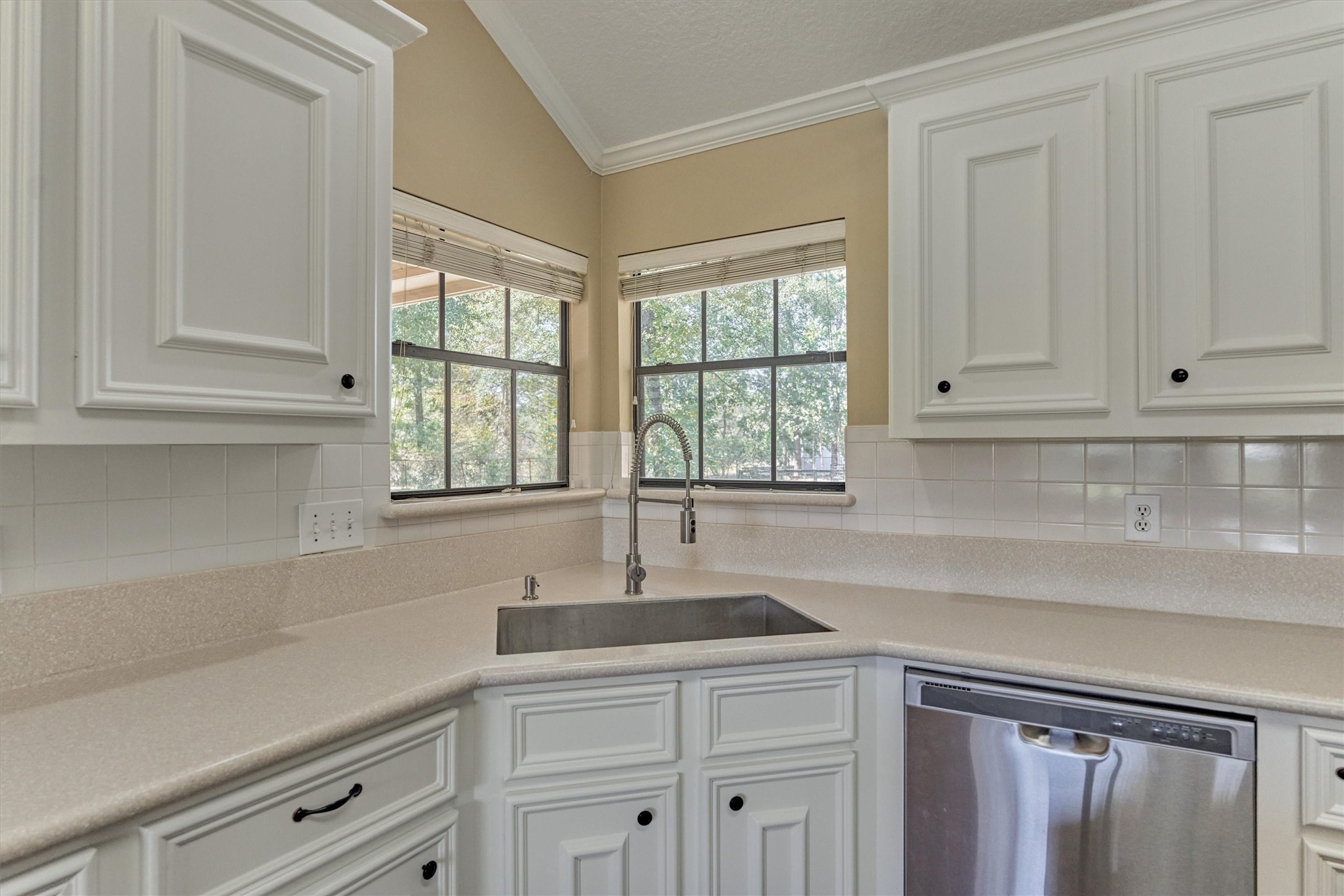 16024 Rabon Chapel Road Montgomery, TX 77316 - Photo 20 of 43 A charming corner window at the large single basin sink overlooks the front yard and driveway.