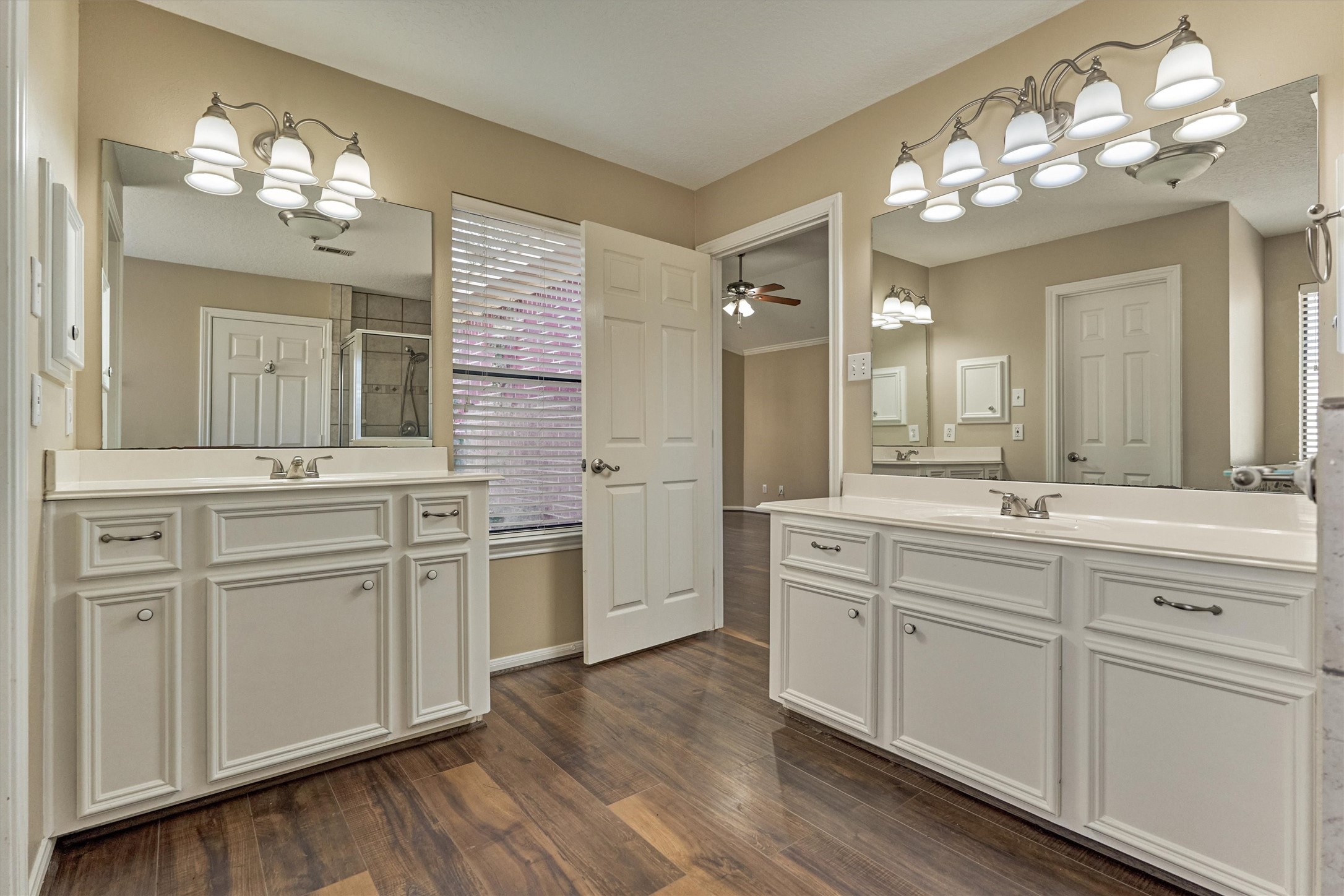 16024 Rabon Chapel Road Montgomery, TX 77316 - Photo 26 of 43 The two vanity areas offer plenty of storage and counter space. One is slightly elevated for comfort and convenience.