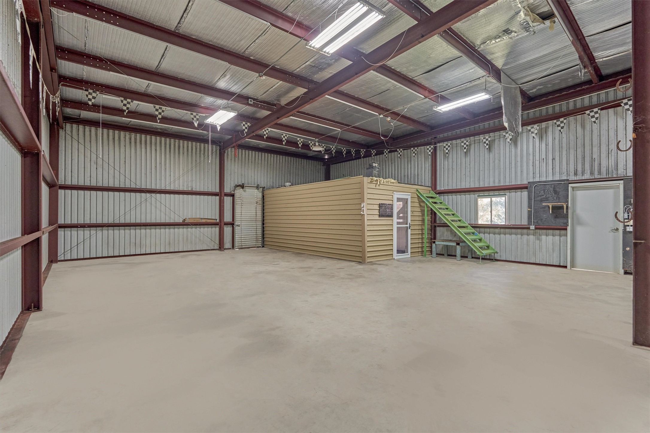 16024 Rabon Chapel Road Montgomery, TX 77316 - Photo 36 of 43 A separate office/workroom space is located in the back of the shop.