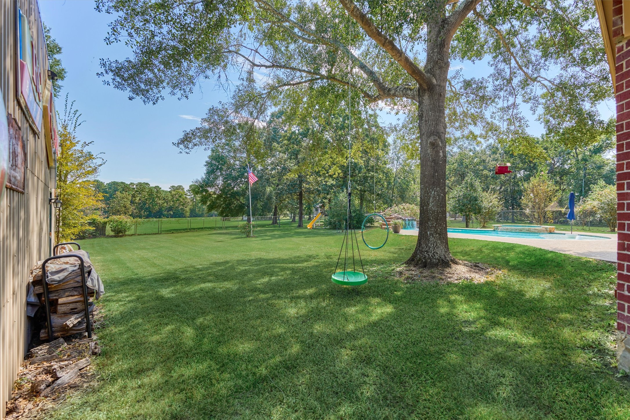 16024 Rabon Chapel Road Montgomery, TX 77316 - Photo 38 of 43 The shaded backyard with mature trees is perfect for swings and yard games.