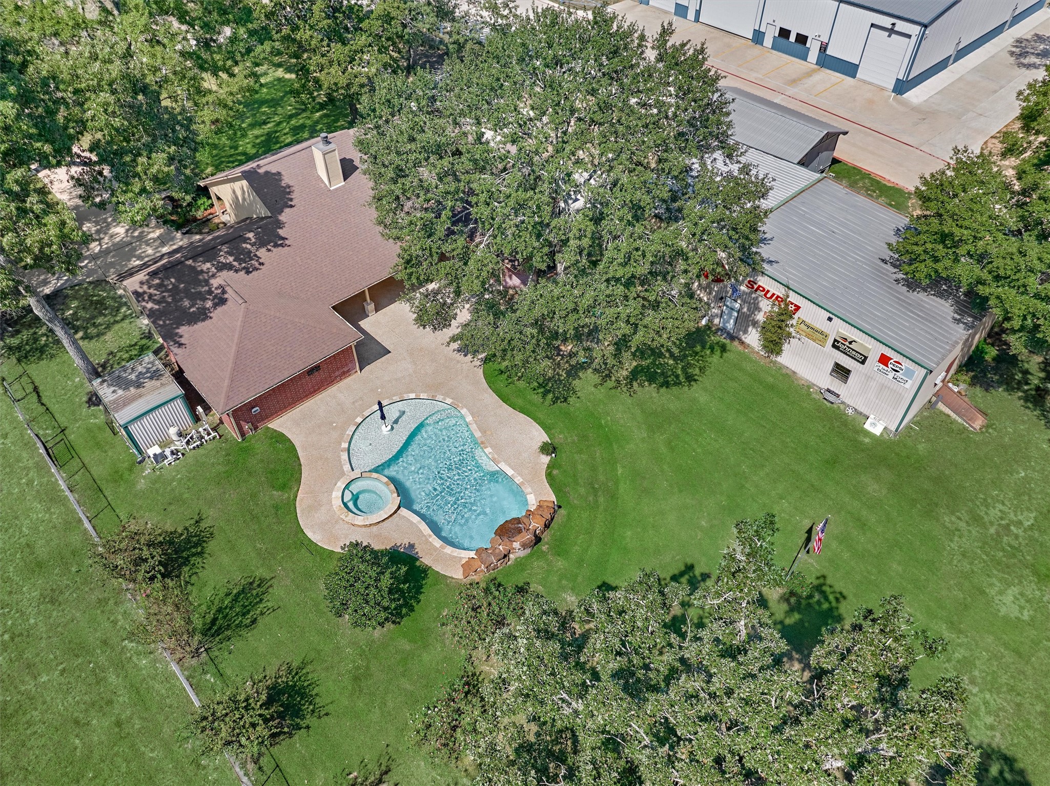 16024 Rabon Chapel Road Montgomery, TX 77316 - Photo 4 of 43 The large workshop provides great storage and privacy in your backyard.
