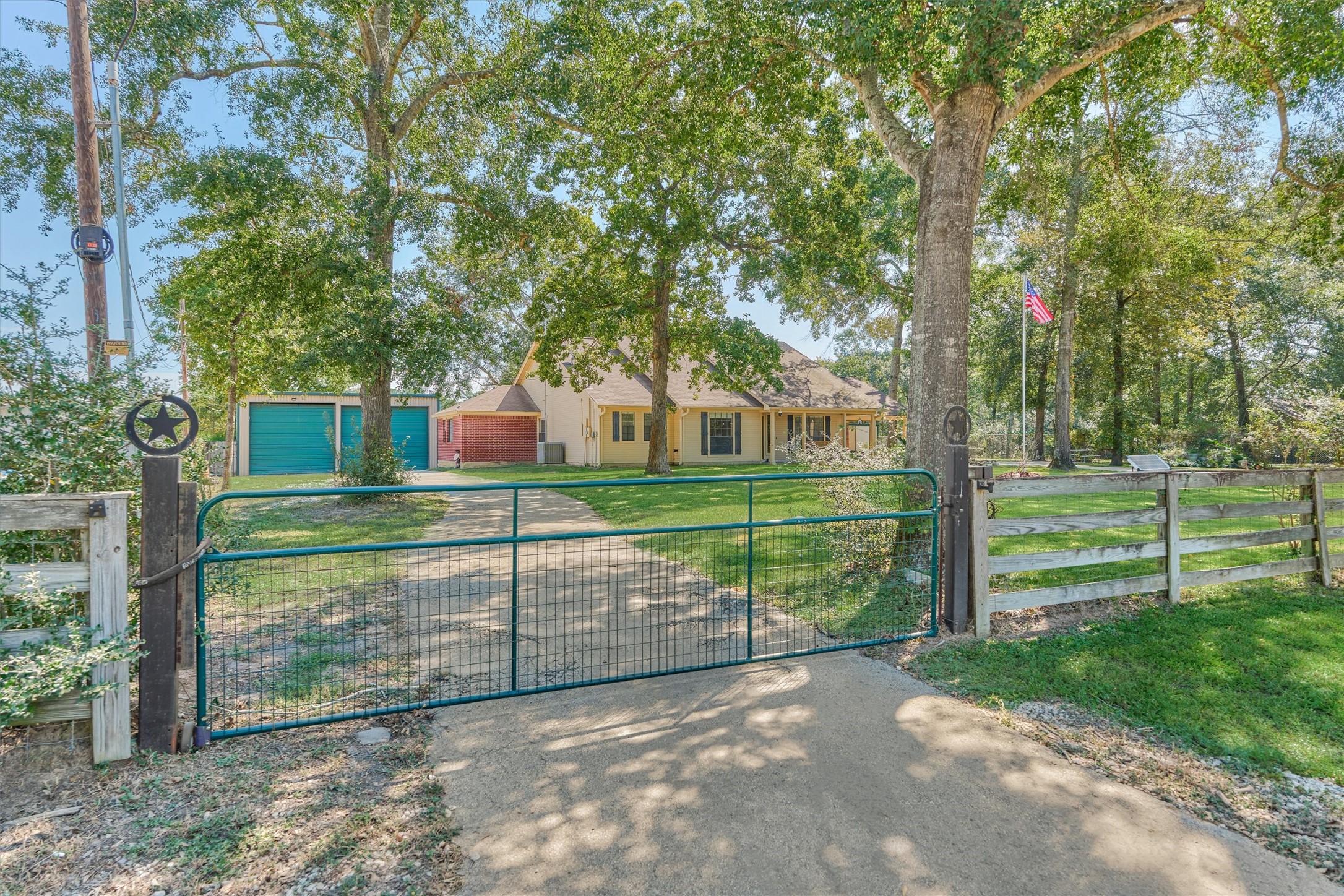 16024 Rabon Chapel Road Montgomery, TX 77316 - Photo 7 of 43 A second driveway also has a gate for added security.