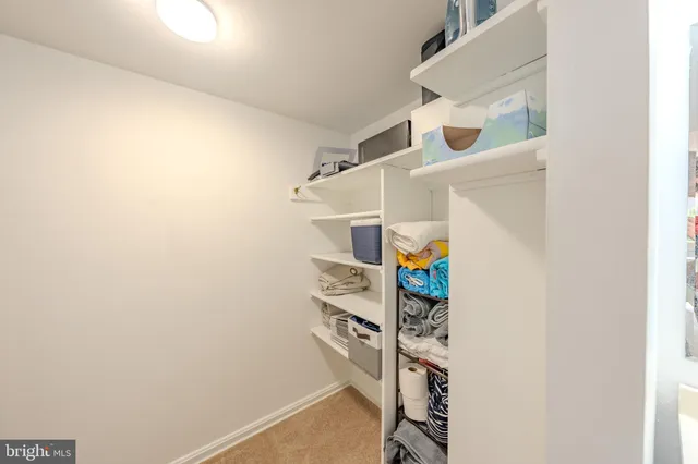 a view of entryway with hallway and stairs