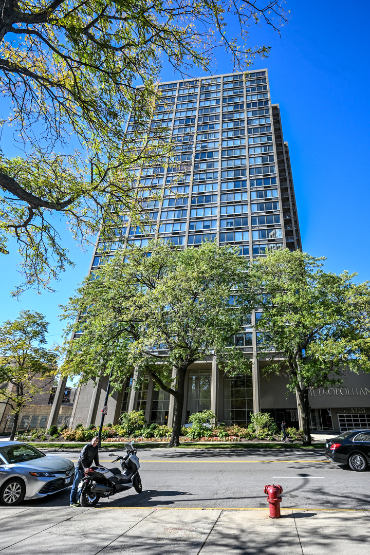 a view of street with tall buildings