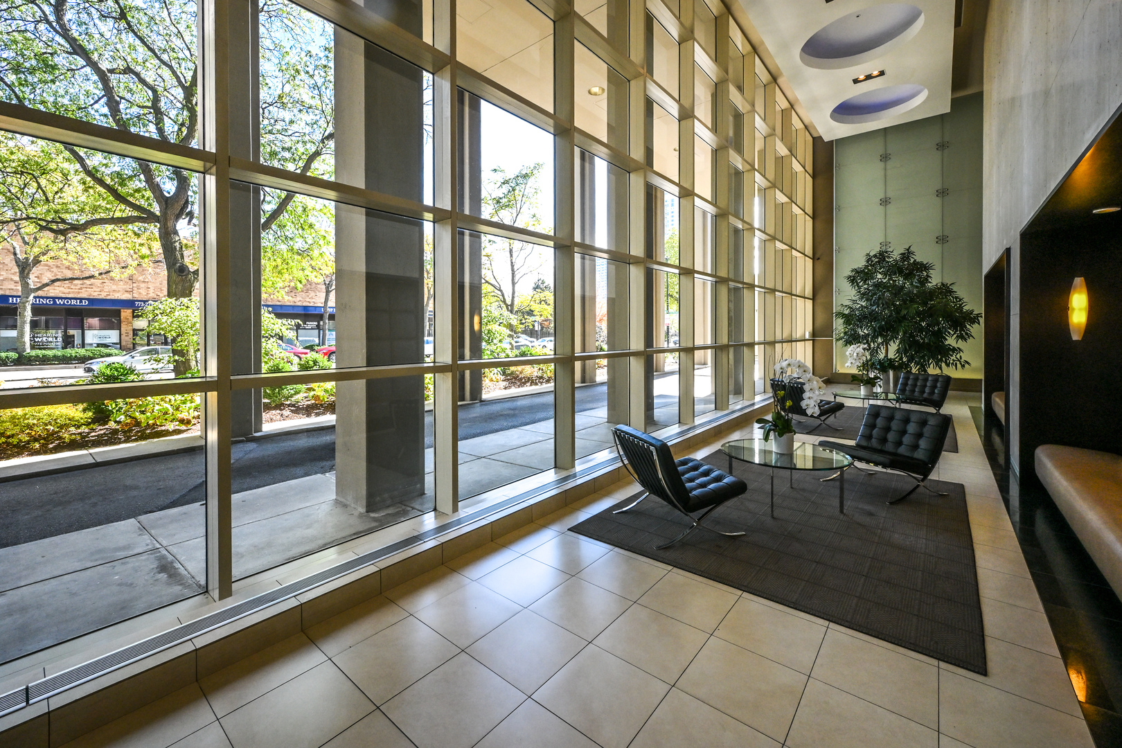 5320 North Sheridan Road, Unit 1011 Chicago, IL 60640 - Photo 3 of 37 a living room with a large window