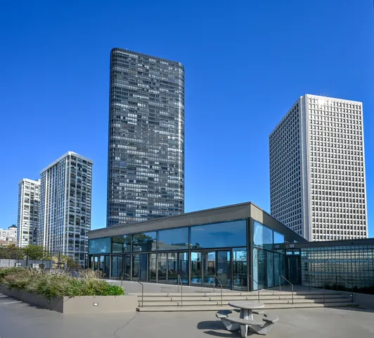 a front view of a building with a street
