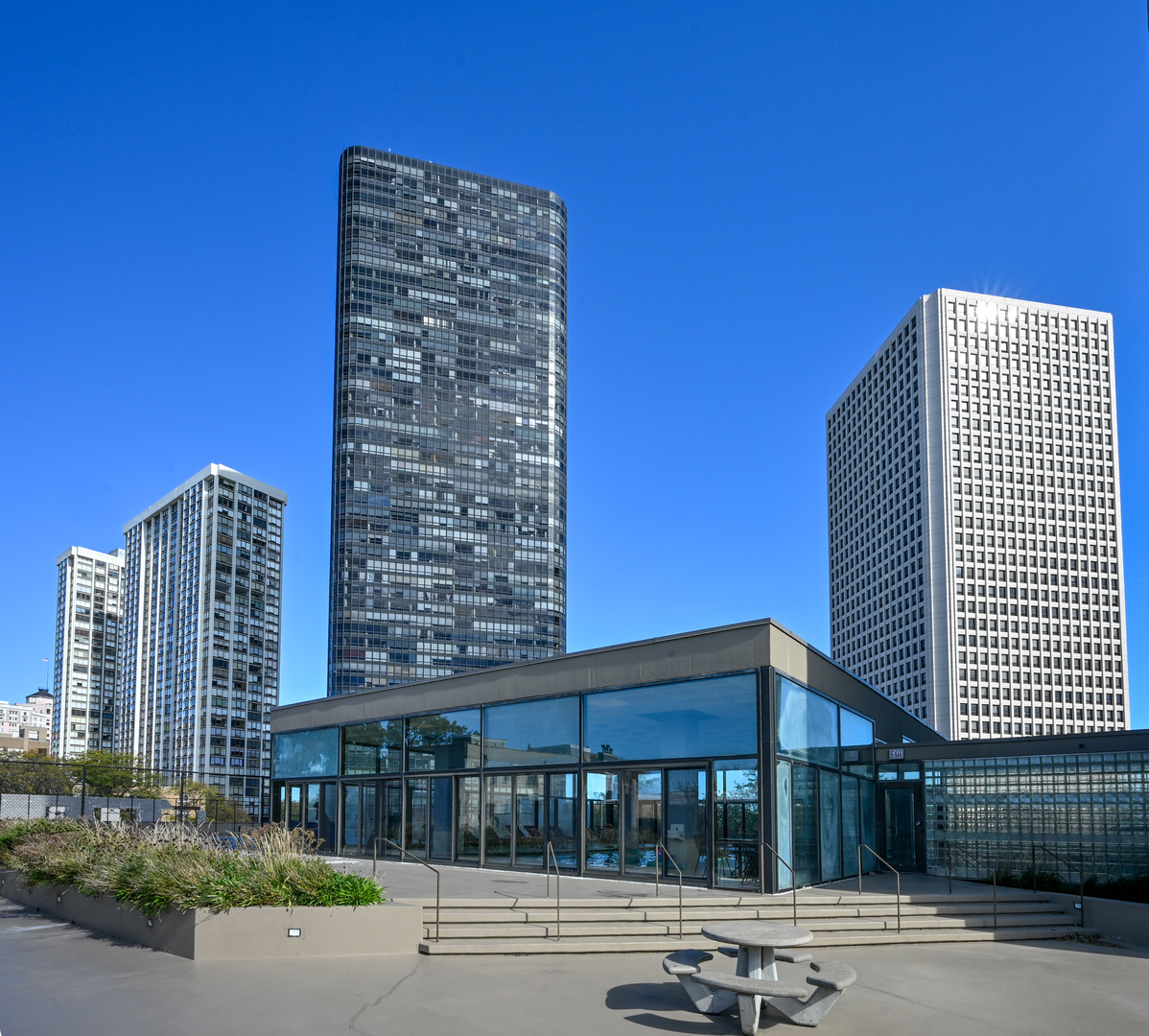 5320 North Sheridan Road, Unit 1011 Chicago, IL 60640 - Photo 32 of 37 a front view of a building with a street