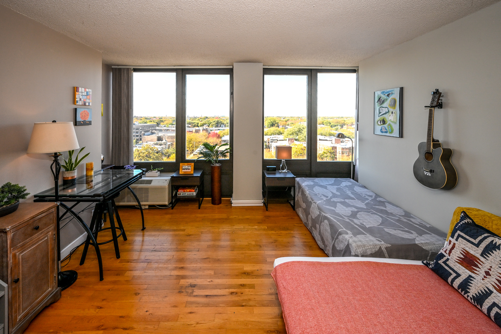 5320 North Sheridan Road, Unit 1011 Chicago, IL 60640 - Photo 7 of 37 a living room with furniture and a large window