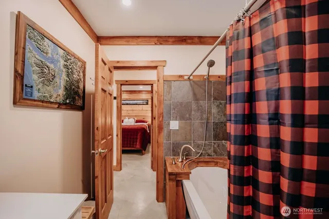 a bathroom with a sink vanity and mirror