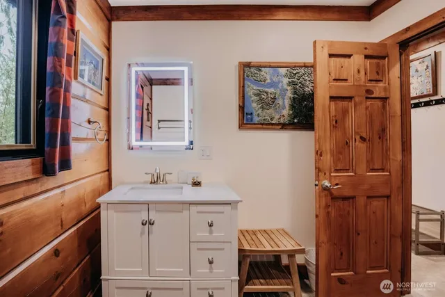 a utility room with multiple dryer and washer