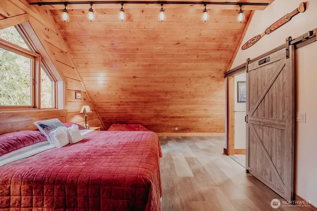 a blue and white building with a clock on the side