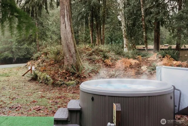 a table and chairs in a garden